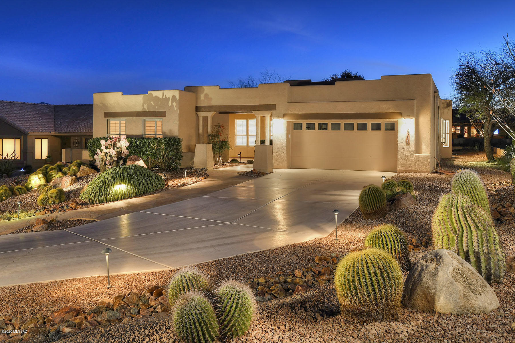 This pristine, expanded Estancia is a stunning example of gracious and inspired living. Arrive to this stunning elevated lot at the end of the cul-de-sac to this long driveway and abundance of  space surrounding the home.  Common areas to the side and rear of the home with sought after N/S orientation with grand views East to the Catalina Mountain range. Rock water feature in rear. Meticulously cared for. Home features  Bay window with Hunter Douglas window treatments and wooden shutters. Ceramic tile throughout - no carpet! The kitchen is a chef's dream with spacious prep island and marble  kitchen counter tops. Garden window at kitchen sink with wide open desert views where you can watch frequently traveled wild life.  Detached Guest House with fabulous courtyard. The garage has 4 ft extension, epoxy floors and plenty of storage. Enjoy the lifestyle, amenities and luxury that abounds in this gem. Saddlebrooke living at its very best.