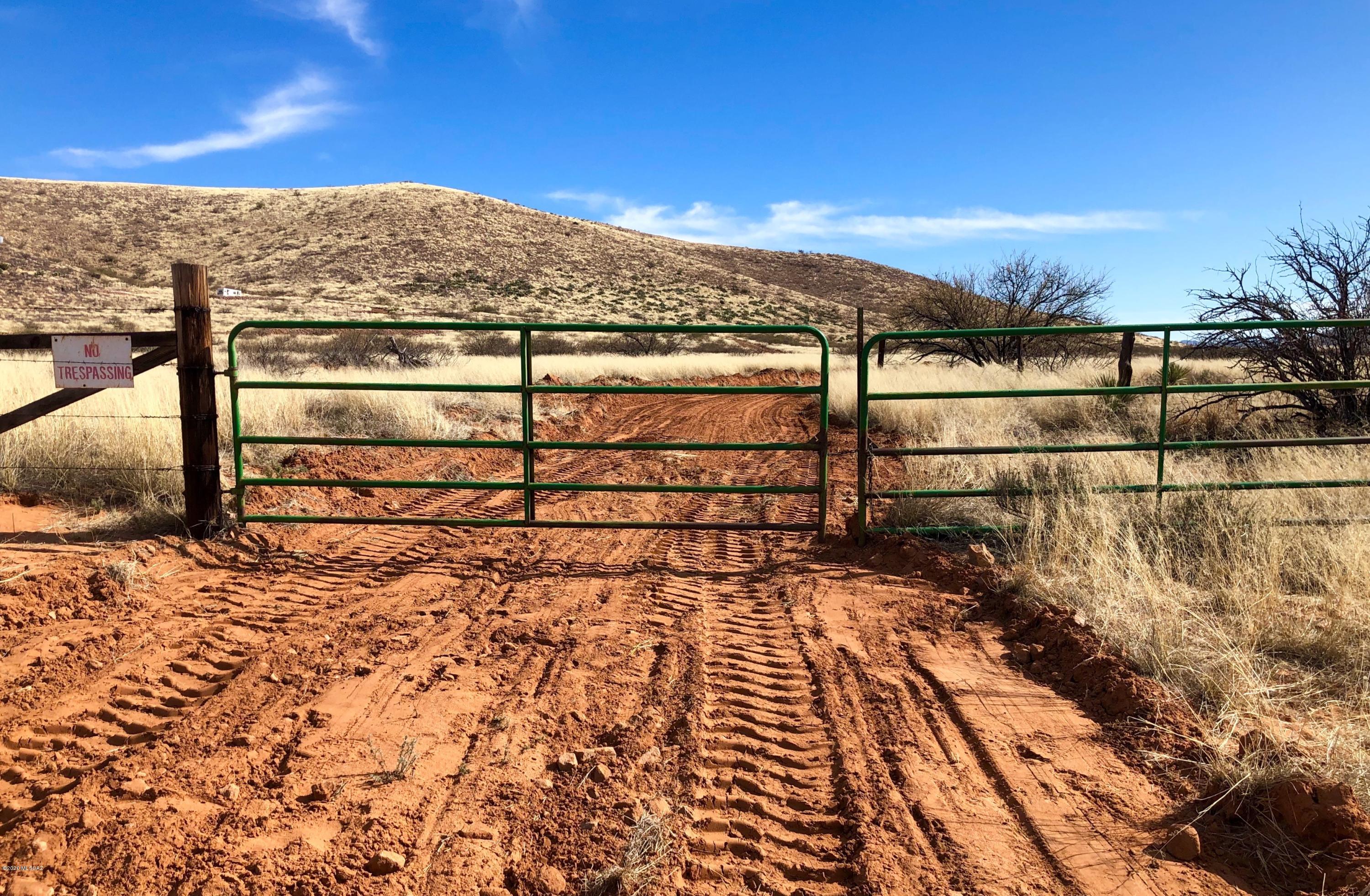 2020 Year End Special! Seller has reduced the price by 5+% through the end of 2020. The new/current list price breaks down to just under $630/acre, making this gem one of the best buys in all of Southeast Arizona for triple digit acreage! PRIDE IN OWNERSHIP! Sellers had 1+ MILE of road re-graded, including the main driveway, (about 1/3 mile, one-way), of this breathtakingly beautiful 235+ acre hillside property that is one of the finest in Ash Creek Ranch. Venturing to the top will reward you with 360 degrees of awesomeness. The property boasts several *improvements (*SEE DOCUMENTS TAB FOR LIST), providing a lovely start for future development, such as: private well, huge metal water storage tank, septic, concrete foundation, and some perimeter fencing & cross-fencing. Seller may carry with REASONABLE down payment, REASONABLE length of term, and purchase price toward upper end of the range. Property has been range priced to account for Seller's willingness to consider various terms. The rolling topography & mini-mountain that encompass the subject parcels makes for your own private world; yet w/ Hwy 181 about 3.5 miles away 'as the car drives,' you'll still enjoy the convenience of not being too far off the beaten path. Two of the three parcels have Agricultural (''Ag'') status. Sellers might plant a species of Agave that can be turned in to Sotol.