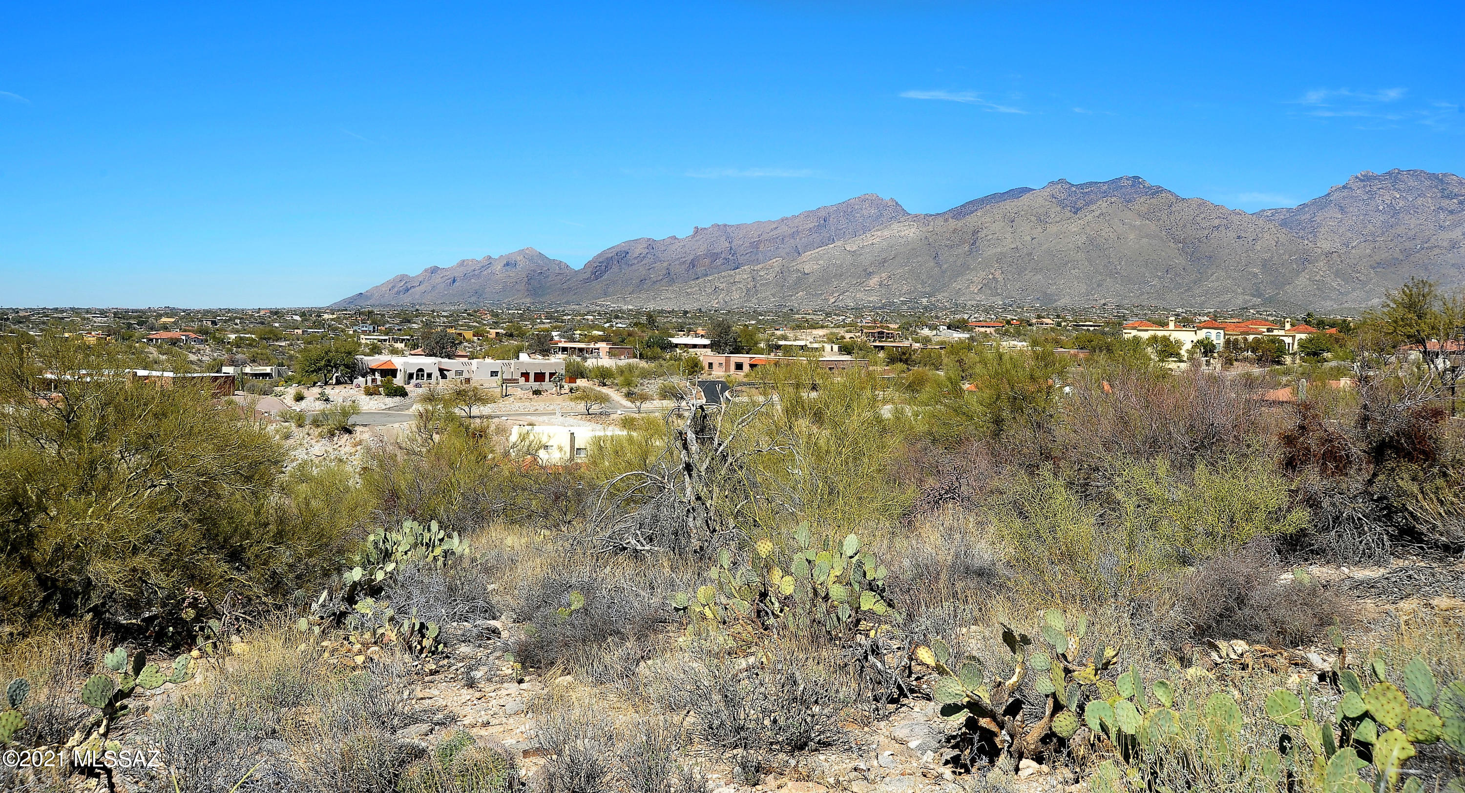 Location Location Location.  Incredible mountain and city views. Design and build your dream home or save a lot of time and use the sellers plans and approvals.  A beautiful  3500 sq. ft home with attached guest house and a 3 car garage has already been designed for this lot and has been approved by the county.  Pull permits and start immediately .  Call Danny 520-490-4000 for more information on the floor plan and design features.
