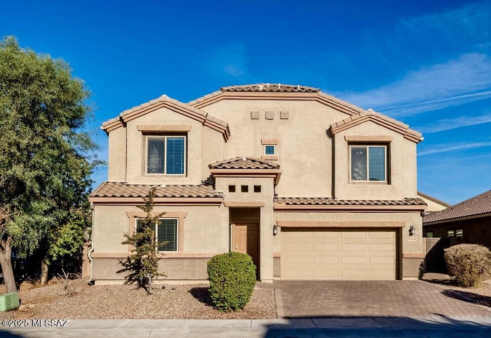 This welcoming two-story home in Saguaro Bloom offers a versatile layout and thoughtful design details. On the main floor you'll find a bedroom and full bathroom- ideal for guests or multi-generational living; the possibilities are endless! The kitchen stands out with its stainless steel appliances, generous island, and expansive walk-in pantry. The backyard is a masterpiece, meticulously landscaped with pavers and artificial turf, creating an oasis for outdoor entertaining and relaxation. Upstairs the loft provides a flexible space that can be tailored to your needs- whether it's a home office, play area, or media room. The primary bedroom is a sanctuary, offering a fully remodeled shower that exudes luxury and sophistication. The walk-in closet provides ample storage for all your belongings. Living in Saguaro Bloom means access to an array of community amenities including parks, pools, a basketball court, walking and biking trails, and so much more. There's a reason so many individuals are making the move to Saguaro Bloom- come and see for yourself!