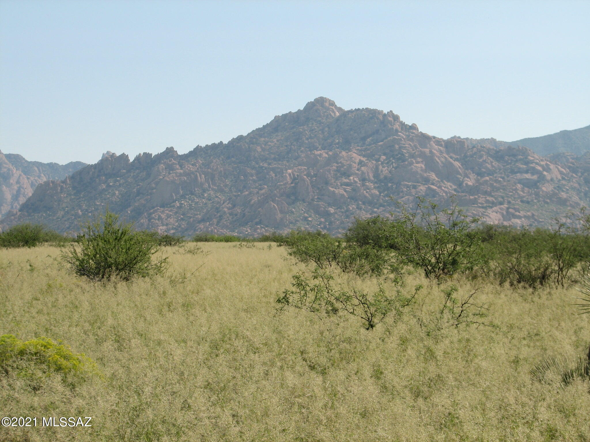 Breathtaking, panoramic views !  Views of the historic Dragoon Mountains, the San Pedro Valley, the Whetstone Mountains, Sunrises and Sunsets! Beautiful.   Rolling terrain with abundant native vegetation, mature mesquite, open grassy meadows.   Underground Electric and Phone in De Vaca Circle.   Property east line fronts on Horse Ranch Road and west line on  De Vaca Circle. East is an historic 7,400 acre ranch for added privacy.  Close to the National Forest for miles of riding in the scenic Dragoon Mountains !