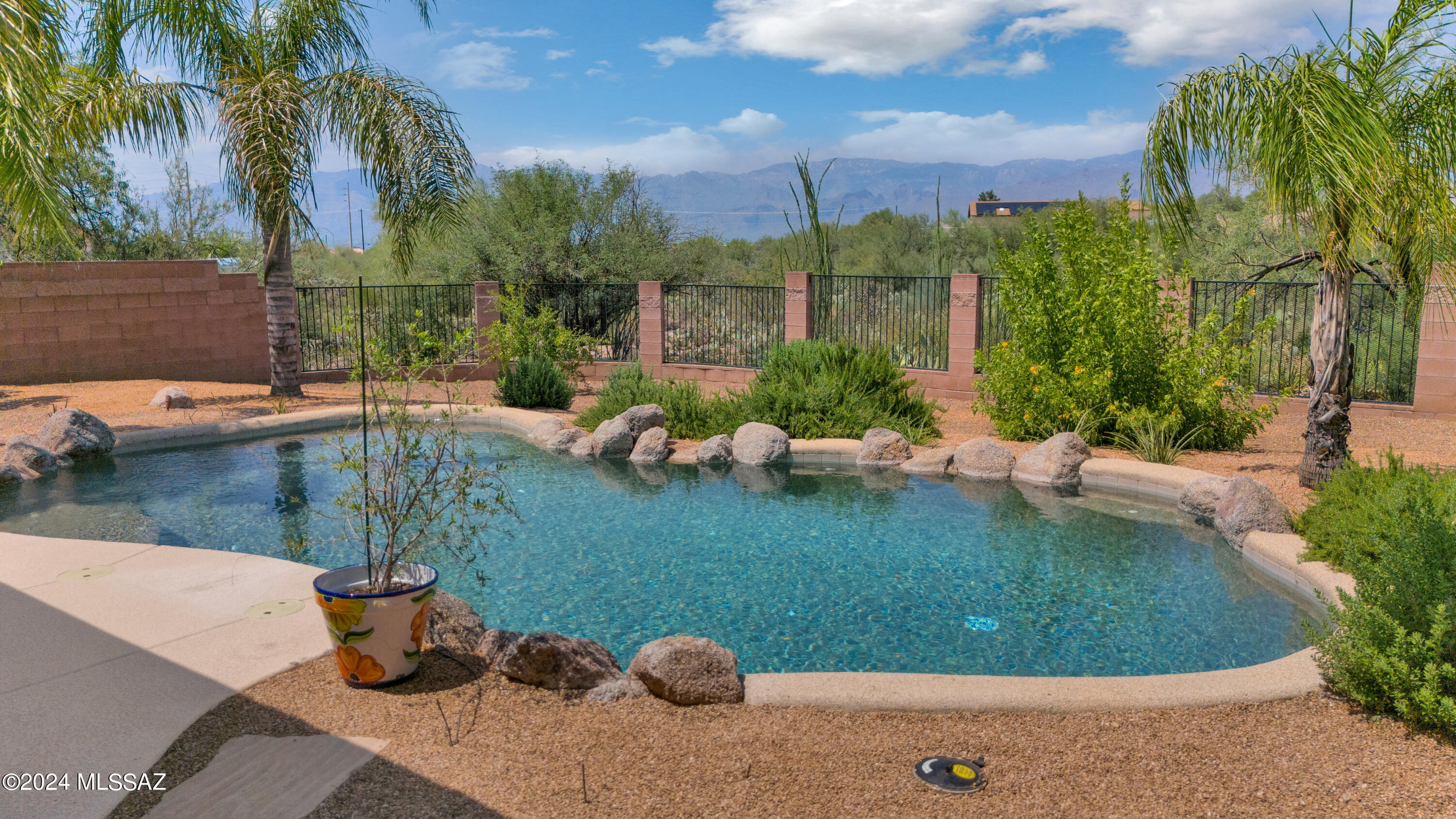 This is the one you have been waiting for ! !
Totally remodeled 4 Bedroom on .62 acre with mountain views and pool. High ceiling and ceramic tile thru out. Open floor plan 
Great room with fireplace, custom kitchen,
large dining room with built in buffet and another open space perfect for kids' playroom or pool table. Master bedroom suite with beautiful bathroom with Corion counters, and a slider to patio and hot tub the perfect place to relax. The other bedrooms are spacious, and baths have been remolded. Newer 2022 Amanda high Efficiency package heat pump with 16 seer, new roof 2022, exterior painted in 2022 and windows replace in 2014. Wonderful private patio with built in BBQ, pool, spa, and Mountain Views. No HOA.