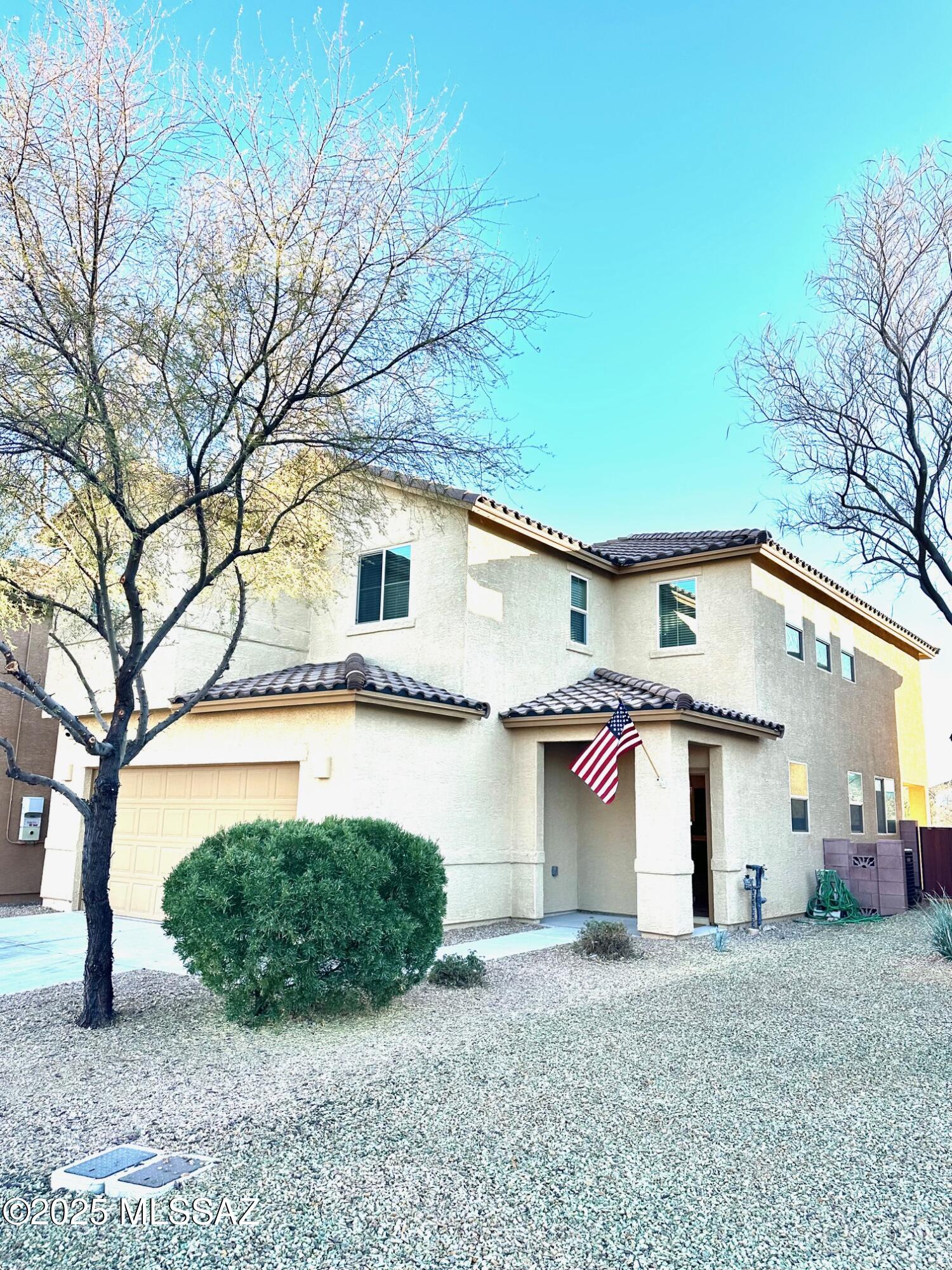 This home has it all.....Spacious 3bed 2.5 bath with additional loft AND den. Could easily be a fourth bedroom. Kitchen with a full suite of  stainless steel appliances, ample cabinets and large island. Perfect for family gatherings! Beautiful plank flooring. Completely finished back yard with mature desert landscape. Recessed lighting throughout. No neighbors directly  in front of or behind, lots of privacy.