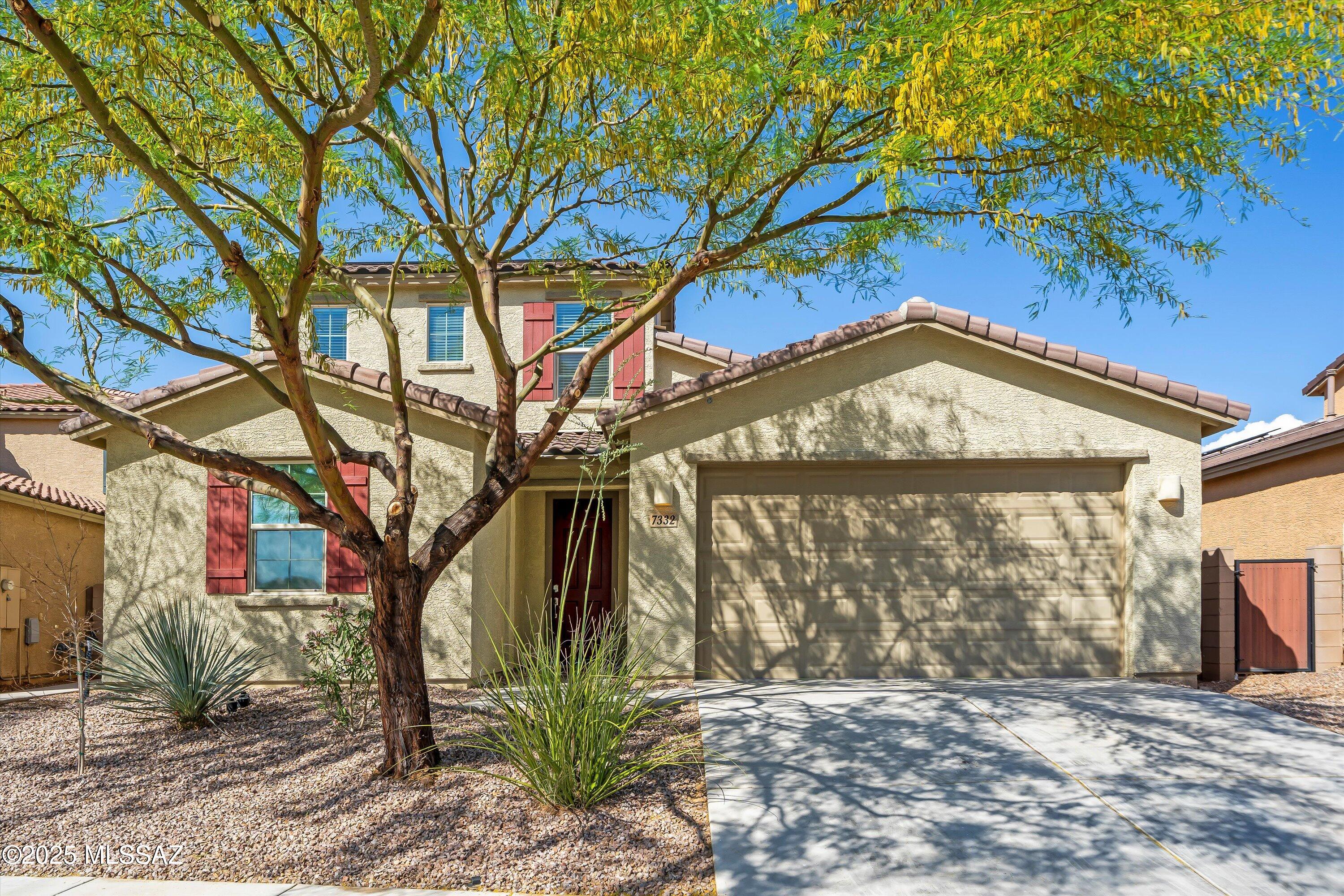La Estancia beauty with tons of builder upgrades throughout. This 4-bedroom, 3-bath has an open floor plan that is great for entertaining. The kitchen features upgraded cabinets and countertops with a large island and matching appliances. The primary suite is downstairs with dual sinks and a large walk-in closet. Downstairs has two additional bedrooms and a shared full bath. Upstairs is perfect for a guest suite with a separate living area, 1 bedroom and a bath. The low maintenance backyard features an extended patio, Gazebo with fire pit, and artificial turf. Enjoy low utility bills with the Owned Solar and extra space in the tandem 3 car garage. The community also has multiple parks, a pool, & walking paths. Located on the Chuck Huckleberry Loop, enjoy 131 miles of car free biking.