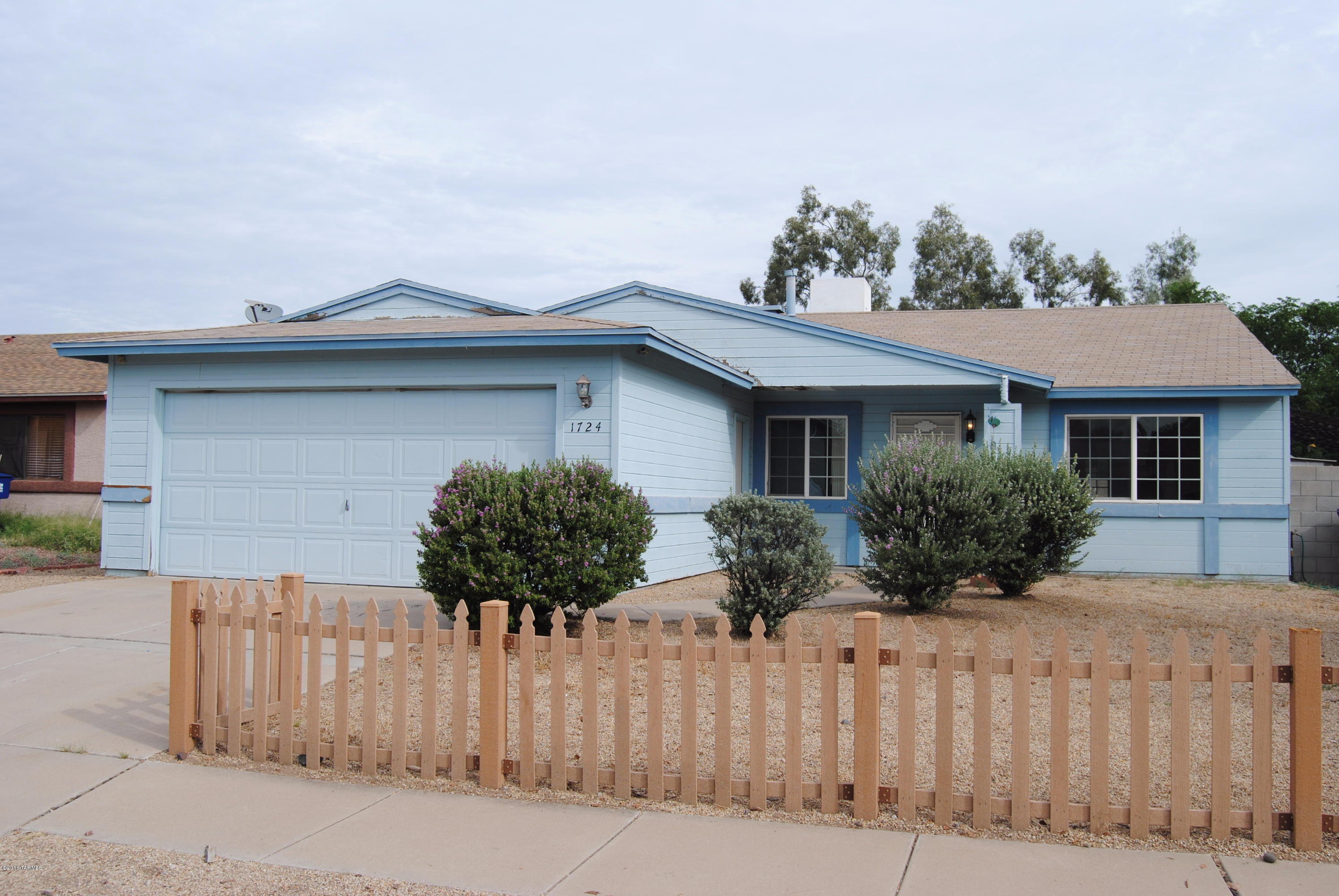 Lovely 4 bedroom/2 bath home with a 2 car garage and lots of potential! This home features a large open floor plan with vinyl wood floors, ceiling fans, an updated kitchen with stainless steel appliances, large backyard, covered patio, and is located close to shopping and all amenities!