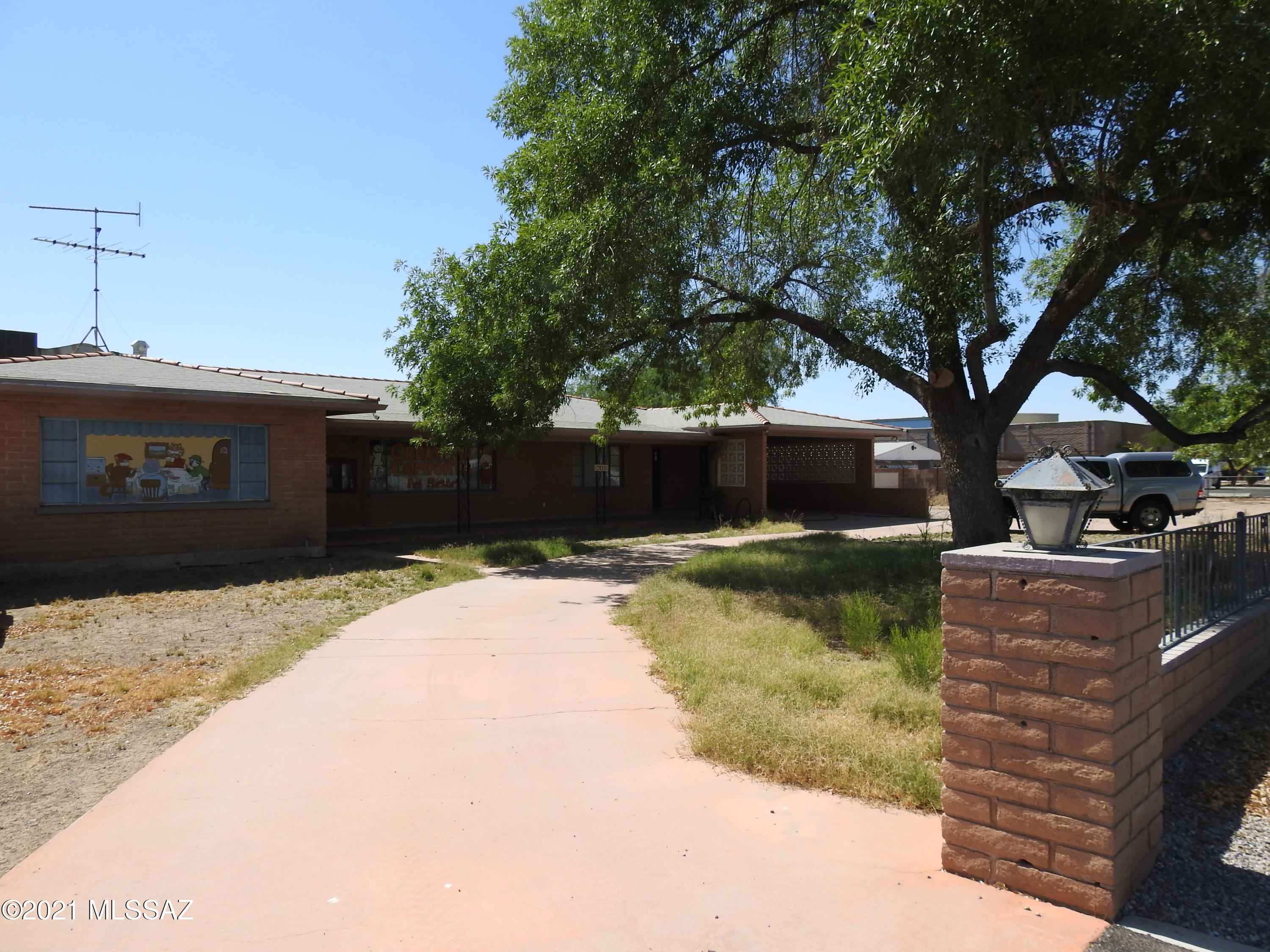 New Commercial Property Opportunity.. Are you looking for a new business location, or looking to relocate or expand an existing Pet Resort/Daycare? Just listed is this Spacious 3016-sf Commercial building on .62 acres, that can be used for just about any commercial business as this is zoned (Marana HI).  This property is in the Opportunity zone which offers tax benefits. Located off Ina minutes from the I-10 Freeway.  that was an Established all indoor overnight pet resort in NW Tucson,  You have 34 dog and 31 cat quarters designed for comfort to to cut down on noise.  There are 5 large outdoor  shaded playground yards with great potential to operate doggie daycare.  You have plenty of room for parking, lots of outdoor storage space, room to expand. Call listing broker for information.