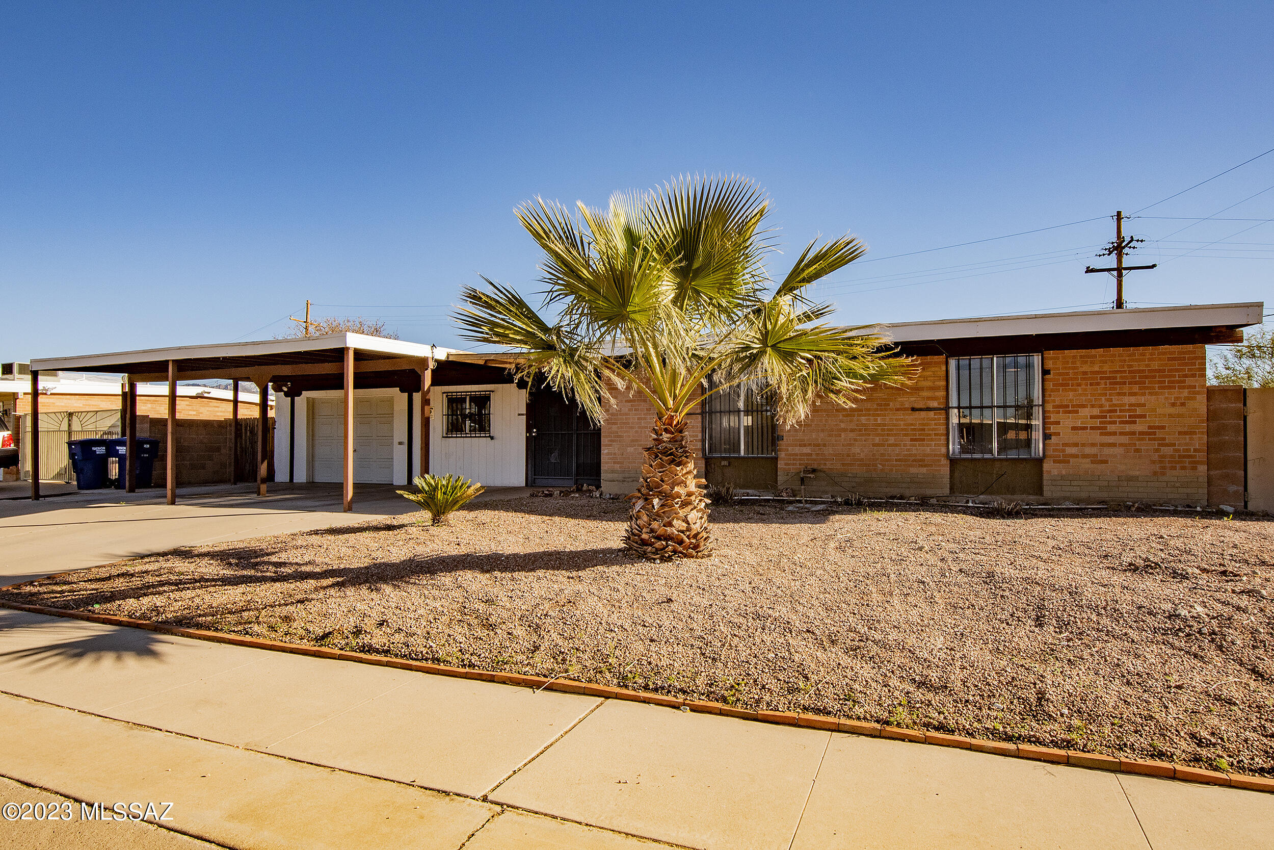 NO MORE SHOWINGS. Must see ranch style home with an abundance of natural light. 2 bedroom/2 bath and a bonus room with a fireplace connected to the living area. The den of the living room could be an office or TV room. Endless possibilities. The house is newly painted, new light fixtures and outlets. Kitchen has new dishwasher, oven and microwave. Also, new water heater in 2022. Enjoy the mountain views from the covered patio and the fountain with Koi fish and a turtle. The right side of the house from the front could be turned into RV parking (previous owner used it for their RV). Seller holds a VA loan that is assumable based on specific terms.