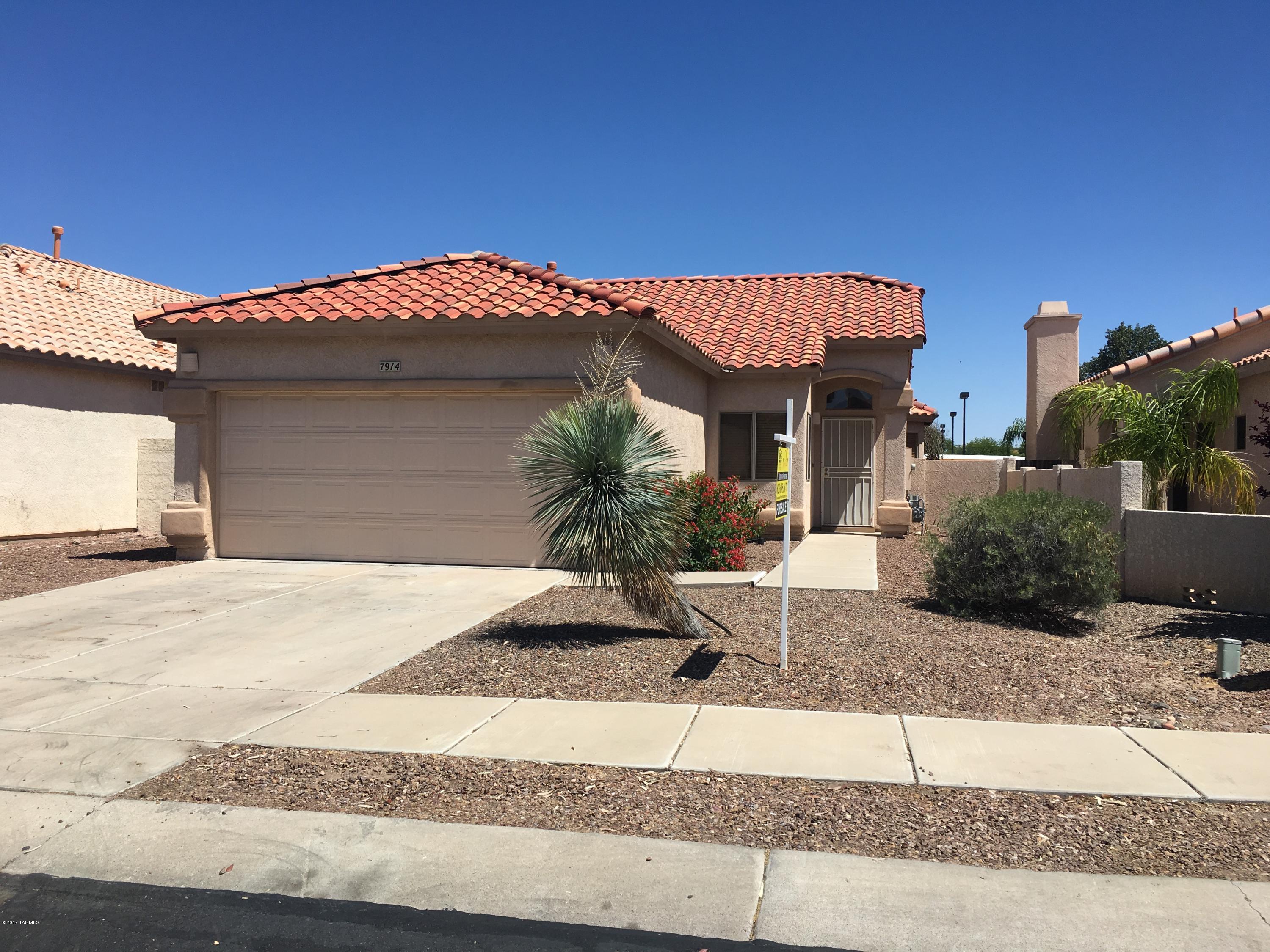 Location, location, location! Fabulous rec center facilities including community pool and spa. Vaulted ceilings, tile throughout, open kitchen, double closets in master bedroom, and a huge covered patio. Must see!