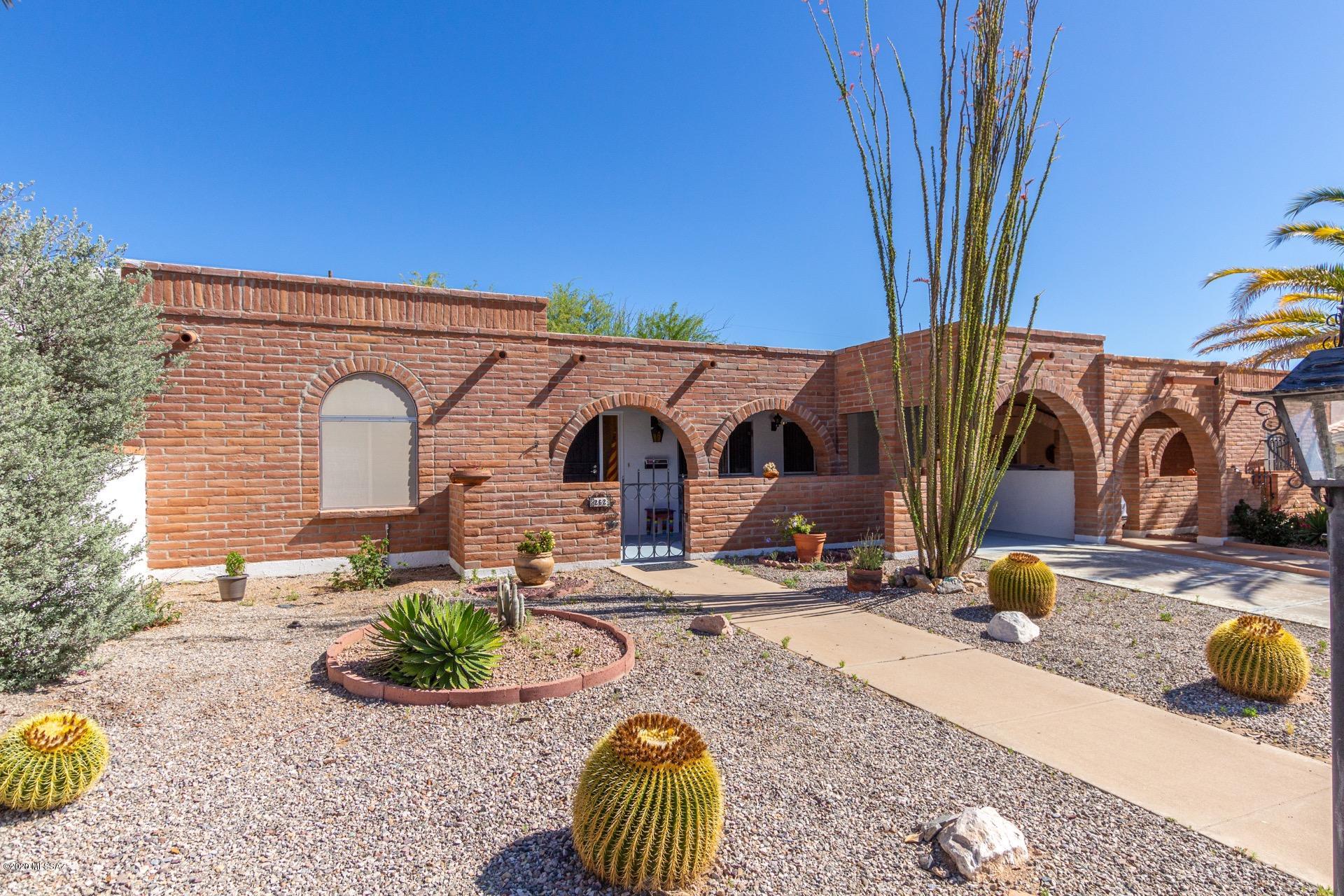 Beautiful 2 bedroom, 2 bathroom single story town-home available in desirable Green Valley.  Excellent adult community with access to Green Valley Recreation with superb amenities including pools, spas, a rec center, clubs and activities, tennis, exercise facilities and more. You will love the gorgeous brick exterior and charming courtyard entrance with a large covered patio. Inside is open, bright and immaculately maintained with neutral paint tones, soft natural lighting and tile and carpet flooring in all of the right places. Spacious living and dining areas. Master bedroom with private 3/4 en-suite. Sprawling backyard patio is very secluded and a perfect spot to entertain or relax and soak up the Sonora sunshine. This gem is a must see. Call to schedule your showing today.