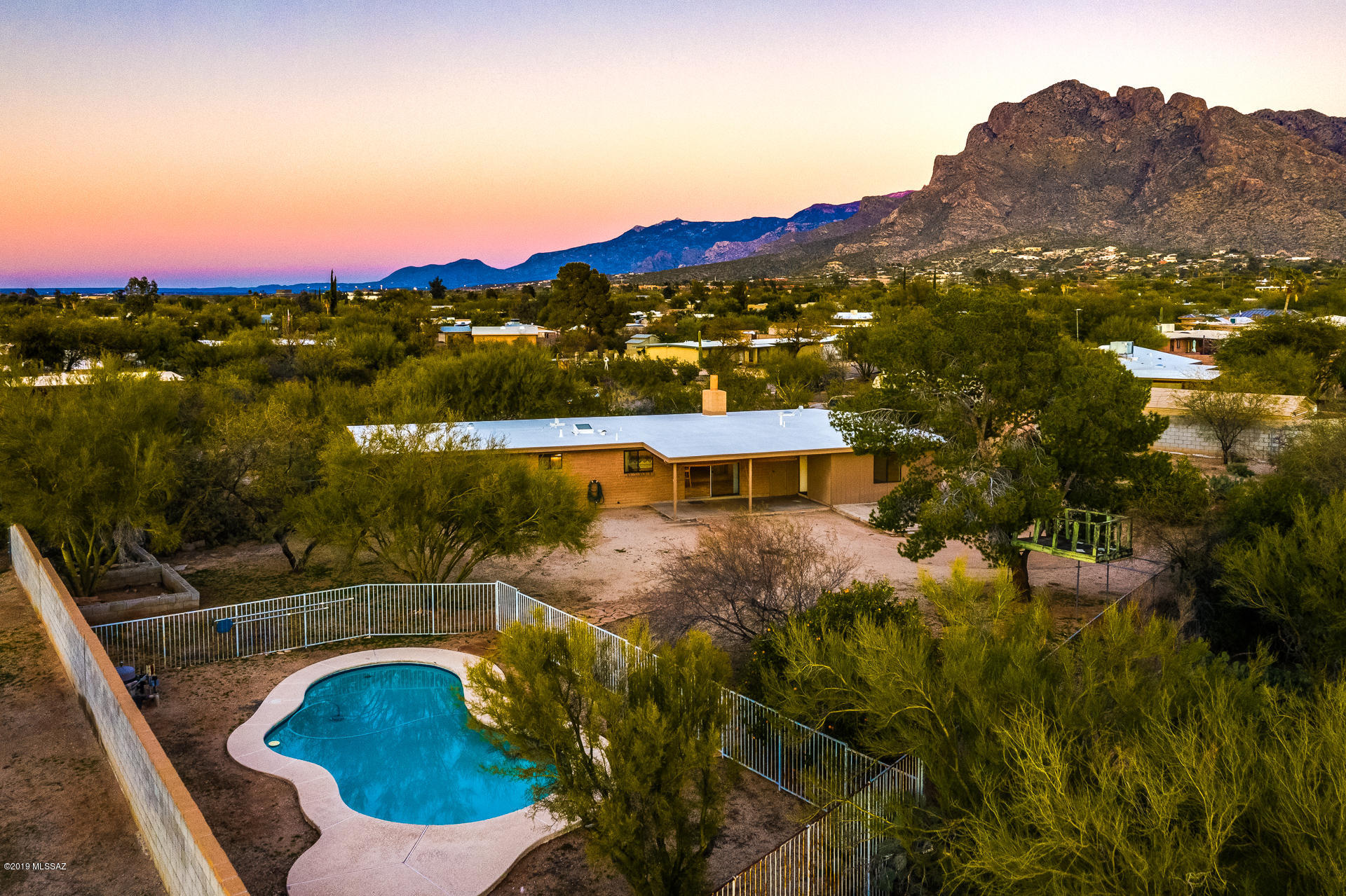 Welcome Home! Tucked away on a quiet street in Rancho Feliz, this delightful home has been lovingly cared for and is ready for you!  Walk in to expansive living space, stylish tile floors, open concept kitchen, and distinct pride of ownership! Don't miss the premium views of Pusch Ridge, dual pane windows, security door, and sparkling pool which is ready for your next BBQ with family and friends! Conveniently located in the heart of Oro Valley, enjoy easy access to some of the best amenities yet feel a world away! Tons of space for all your toys and potential to make this your own! Don't miss this special opportunity!