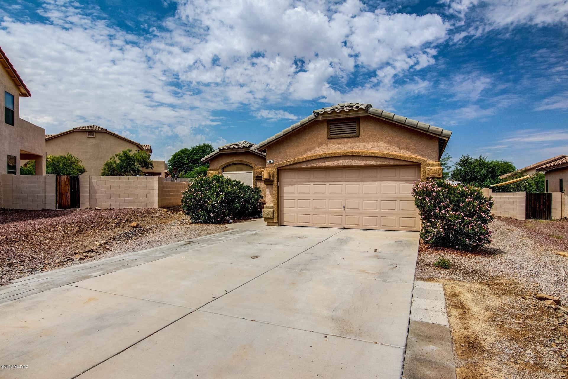 Welcome Home! The interior of this single-story home features three bedrooms and 2 full bathrooms. The exterior includes a graveled landscape with a two car garage and driveway. The back yard includes a covered patio with seating room and large, graveled landscape. Built in courtyard with trees for shade. EXTRA LARGE lot with tons of potential to build an amazing pool!! Come see today!