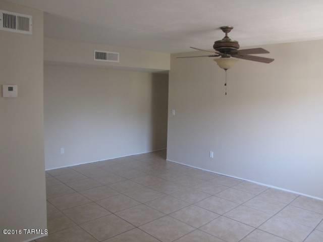 Very clean updated 2 bedroom, 1 bath near Tanque Verde and Kolb.  Upstairs unit, 1 car carport.  Ceramic tile in living areas, carpet in bedrooms, Community pool.  One covered parking space.