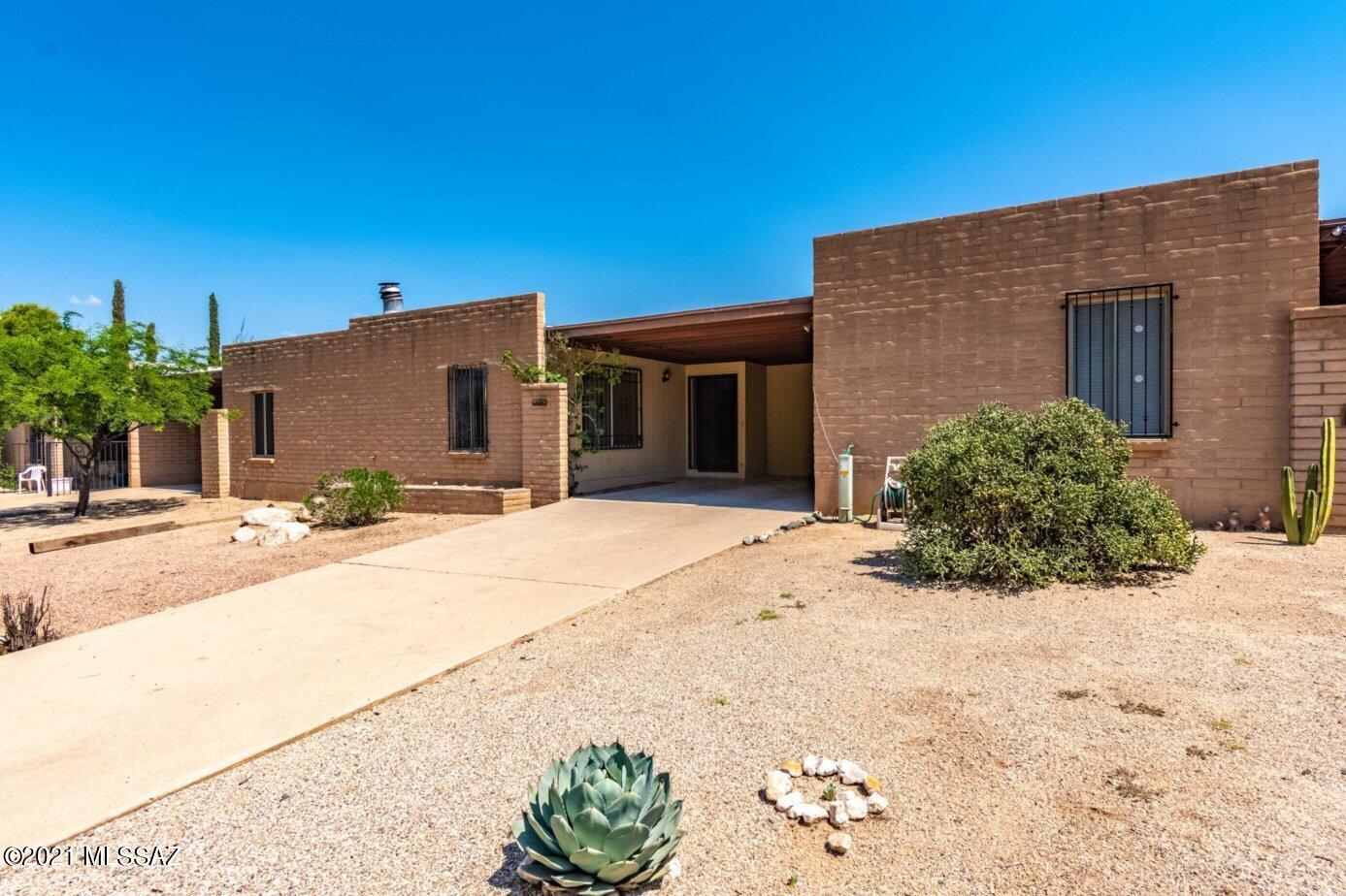SPACIOUS 2 Bedroom, 2 bath town home ready for new owner. Quiet neighborhood, community pool, solid block construction, cozy fireplace to entertain family and friends, close to all amenities.