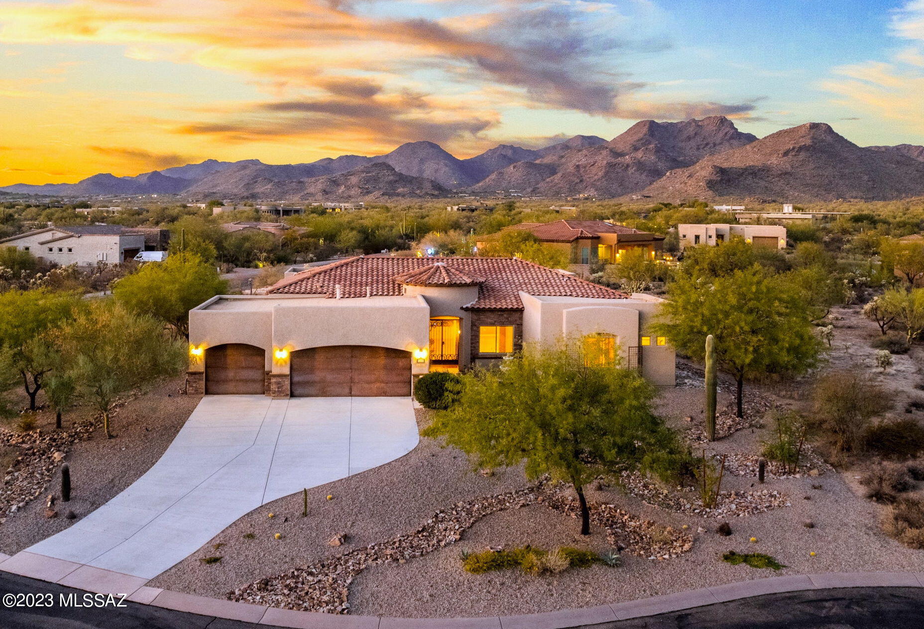 If you're looking for privacy, quiet, & buffer from neighbors, then this is the perfect home for you. Located on a corner cul-de-sac lot within prestigious Tortolita Vistas, a gated community of all single-story homes and where all lots are over three quarters of an acre. Upon entry, you're greeted with a gated courtyard with a beautiful fountain & a custom glass & wrought iron double doors. This 3 bed + office/den, 2.5 bath home boasts a split floor plan with an open concept great room that can host the largest of gatherings. The kitchen showcases gorgeous granite countertops, a newer gas cooktop range, new dishwasher, upgraded cabinets, large island & custom backsplash. The bedrooms all feature plush new carpeting. The exterior is just as impressive as the inside with newer exterior paint & upgraded metal garage doors. The immaculate 3 car garage has epoxy floors and a water softener. The backyard is completely private with an extended covered patio that features motorized retractable screens, ideal for year round outdoor enjoyment. The pool has a new heater, new pool cleaner, and upscale hot tub. Entertain guests with the outdoor TV and fire pit. The backyard also has outdoor kitchen hookups & auto irrigation. This home has been immaculately maintained and is move in ready. All around perfect home!