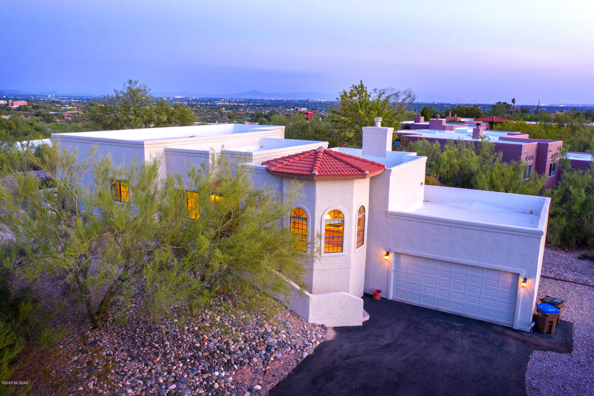 Nothing Better then sitting high on a hill to capture the incredible vistas! With incredible mountain views, this home invites calm and serenity while satisfying family living. This 2442 SqFt home gives everyone their space and accommodates those precious family moments as well. Beautiful granite kitchen with SS appliances conveniently onlooks the family room and eating area.
Spacious bedrooms with sizable walk-in closets, energy efficient windows and both AC units new in 2018.  This one you need to come and see.