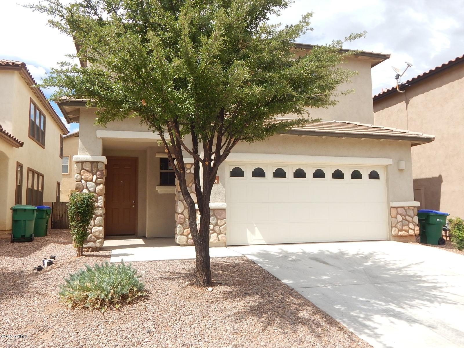 PRICE JUST REDUCED! This is a Fannie Mae HomePath property. With 2237 sq ft of living space this spacious 2 story home has 3 bedrooms, loft, 2.5 bathrooms, dining area, 2 car garage & backyard with covered patio.<FONT COLOR=RED> Recently painted interior with two tone paint, & installed NEW carpet.</FONT> Located in desirable gated community of Lago Sereno in Rancho Sahuarita, walking distance to school, club house, water park, lake, and easy access to I-19, restaurants, shopping & much more! First Time Buyers, complete the HomePath Ready Buyer homeownership course. Attach certificate to offer and request up to 3% closing cost assistance. Ask Listing Agent for more details. Restrictions apply.