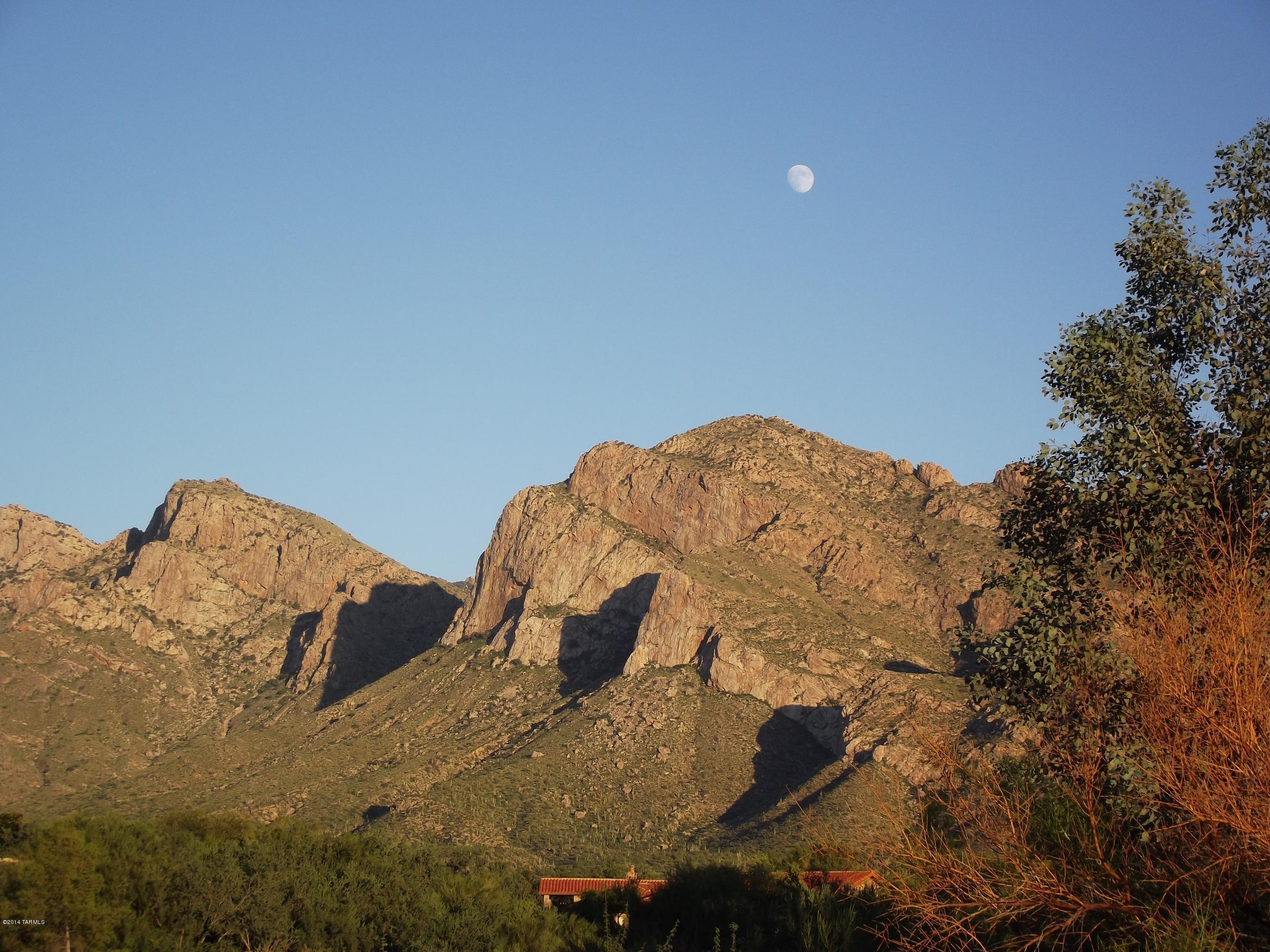 It is all about the view!!!!
Extremely desirable homesite for sale in Oro Valley Estates/Oro Valley Country Club! Just under one acre with stunning Catalina Mountain, Oro Valley and Tortolita Mountain views! This premium lot sits up high and offers incredible views from multiple angles. Probable home direction would have N/S orientation. Minutes from schools and shopping in the heart of Oro Valley. Truly a wonderful location to build your dream home!