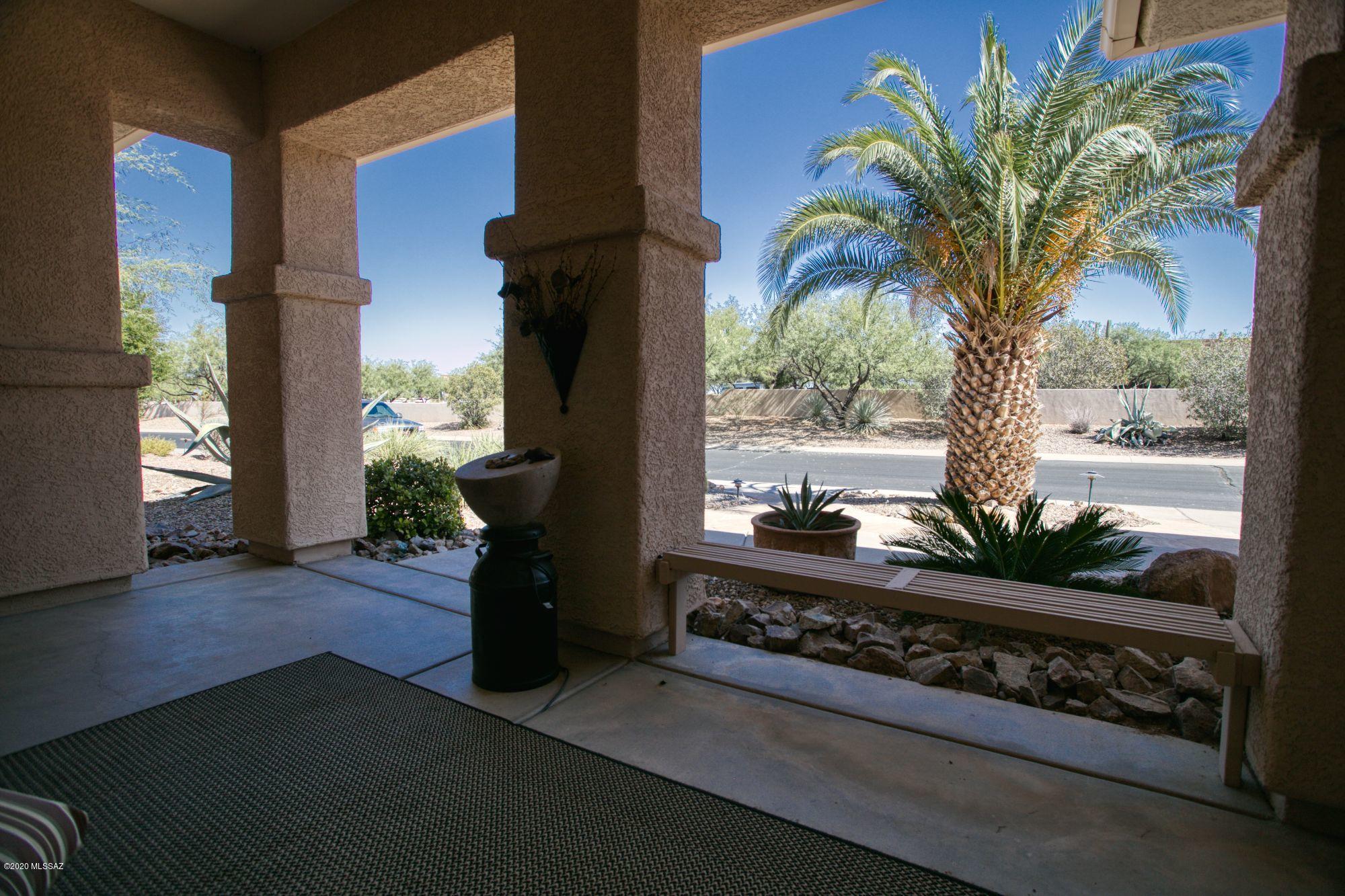 $40,000 PRICE REDUCTION!!  GOLF COURSE - Beautiful former Magdalena model home on the golf course.  Well maintained with lots of mature fruit-bearing trees.  Covered rear patio with sunscreen is a pleasure to watch golfers and wildlife while listening to your soothing fountain.  Inside you will find lovely saltillo tile and carpeted floors.  Upgraded granite & new refrigerator in kitchen.  Split bedroom style provides for a welcomed retreat. Master bath has a new full size shower with a built-in seat.  Half-bath keeps the  visitors out your full baths.  NEW ROOF in 2019. Newer hot water heater.   Some furniture and furnishings will be available by SBOS.  Estate Sale to follow listing.  Date of estate sale TBD.  This beauty will not last.  It is priced to sell.  This one is special.