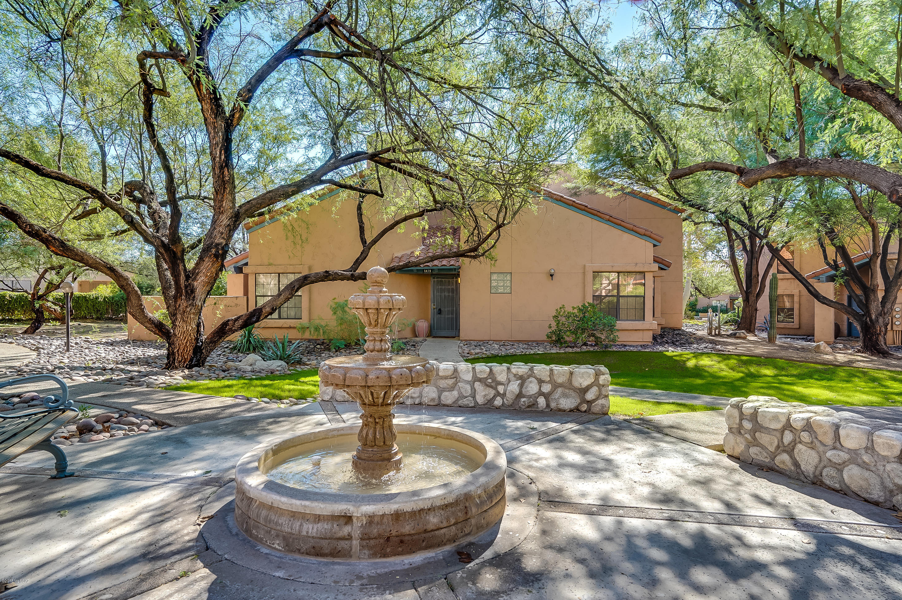 Nestled within highly desired Ventana Del Sabino North. Vaulted ceilings w Wood Burning Fireplace. Kitchen opens to great room. Spacious Master bedroom w a large walk-in closet .  A Murphy Bed conveys with the sale which is perfect for guests. This town home is located away from the street and parking in a tree covered area with a beautiful bubbling fountain nearby. Just moments to Sabino Canyon which is known to be one of the  highlights of Tucson for hiking and enjoying the Saguaro studded hillsides, with plenty of the outdoors to enjoy. The HOA covers water, Fire, garbage, structure, roof. Do not forget about the Tennis courts and two pools, one which is heated year round and the second pool part time.