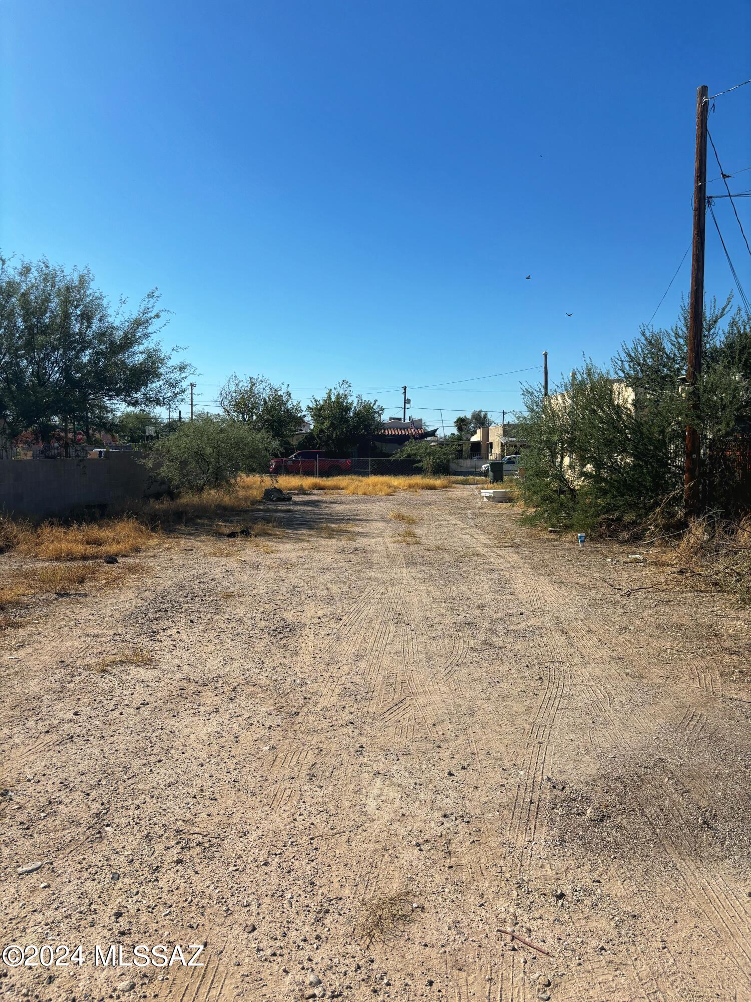 Discover the perfect opportunity to build in the heart of South Tucson! This partially fenced lot, measuring 45' x 147.5', offers endless potential for your next project or home. With electric and sewer on-site and water at the lot line, you'll be ready to break ground in no time. Conveniently located near I-10, I-19, downtown, the University of Arizona, Banner Medical, shopping, restaurants, and more, this lot provides easy access to everything Tucson has to offer.
