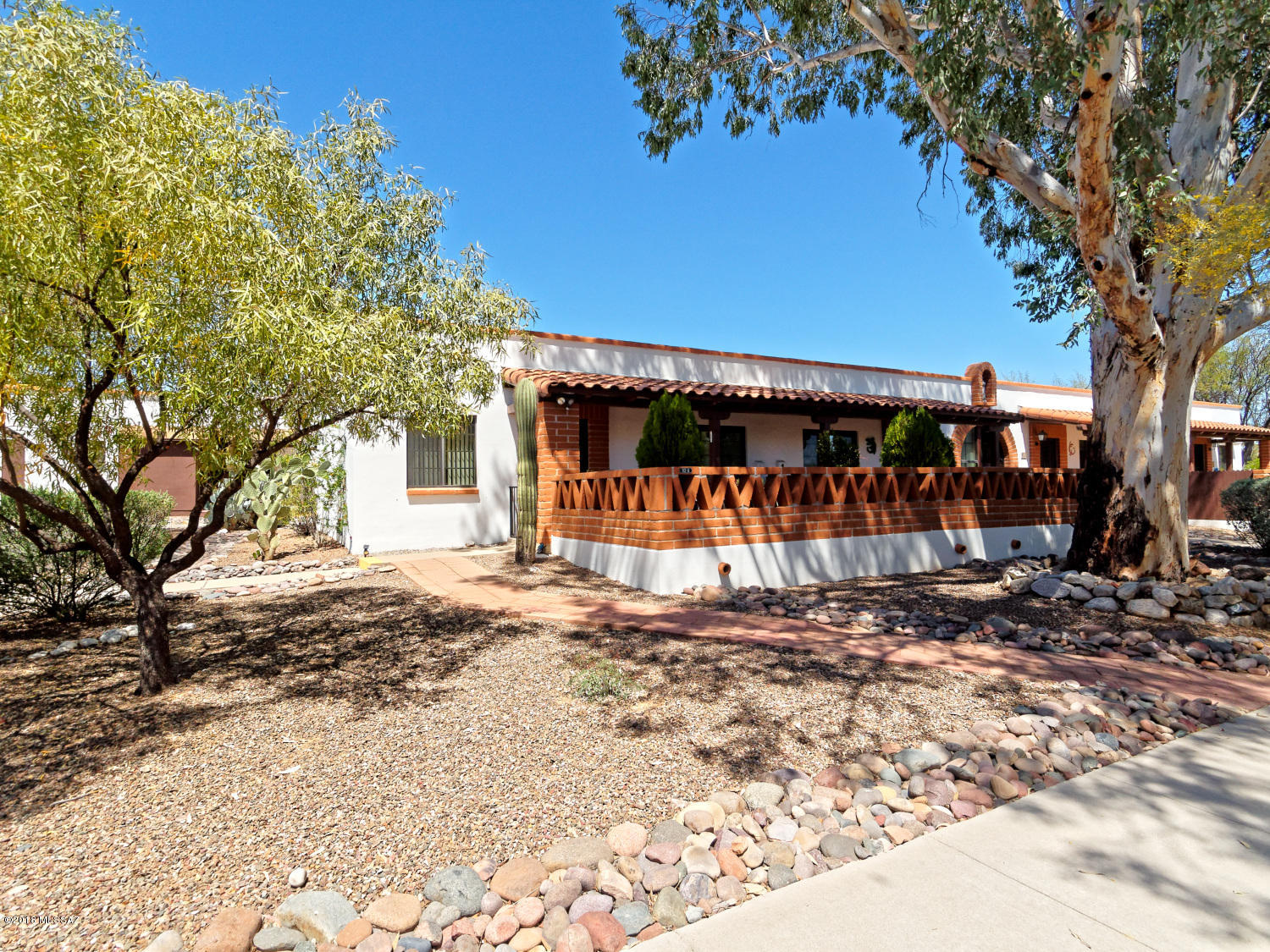 Carefree living at it's  best. This home has an updated kitchen, bathroom and windows. It has fully covered patio and courtyard.