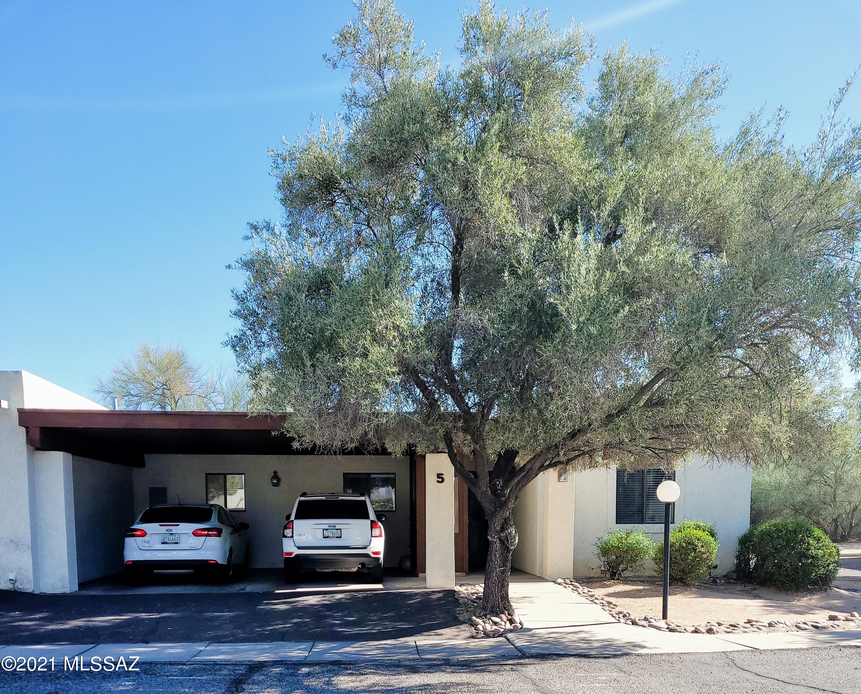 Updated, 2 Bedroom/2 bath condo in Harrison Estates. Single-level Split floor plan with Large master bedroom, walk in closet, dual sinks and updated shower. Spacious Great Room with fireplace plus a Bonus room. All appliances stay. Ceiling fans, dual pane windows, plenty of storage and 2 car carport. End Unit creating privacy with only one common wall. Cozy backyard and a Sparkling Community Pool. HOA takes care of roof, water, sewer, trash, exterior and common area maintenance as well as front yard maintenance.