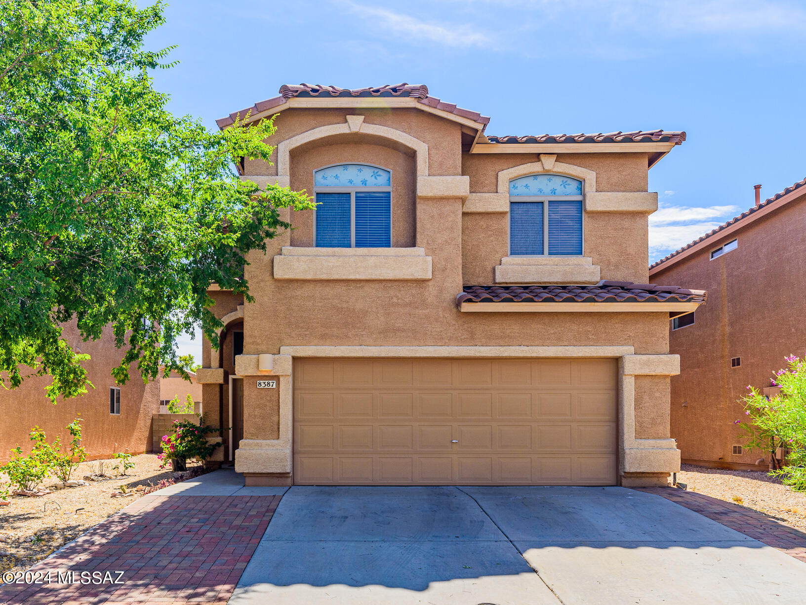 Vail School District! Empire Heights!  This 1948 SF home features 4 beds and 3 baths!  BRAND NEW CARPET INSTALLED! Perfectly designed kitchen features granite countertops, stainless appliances, brand new Samsung French Door Refrigerator, upgraded cabinets, and a large pantry!  Downstairs features powder room, formal living and dining as well as family room off the kitchen!  Large primary bedroom features walk in closet and primary bath features dual sinks and large walk-in shower!  NEWER HVAC and hot water heater!  Nicely hardscaped back yard features large, covered patio, pavers, outdoor kitchen area, mature trees and bushes and planters/flower beds ready for you finishing touch!  Neighborhood features community park and COMMUNITY POOL!  Schedule your showing today!