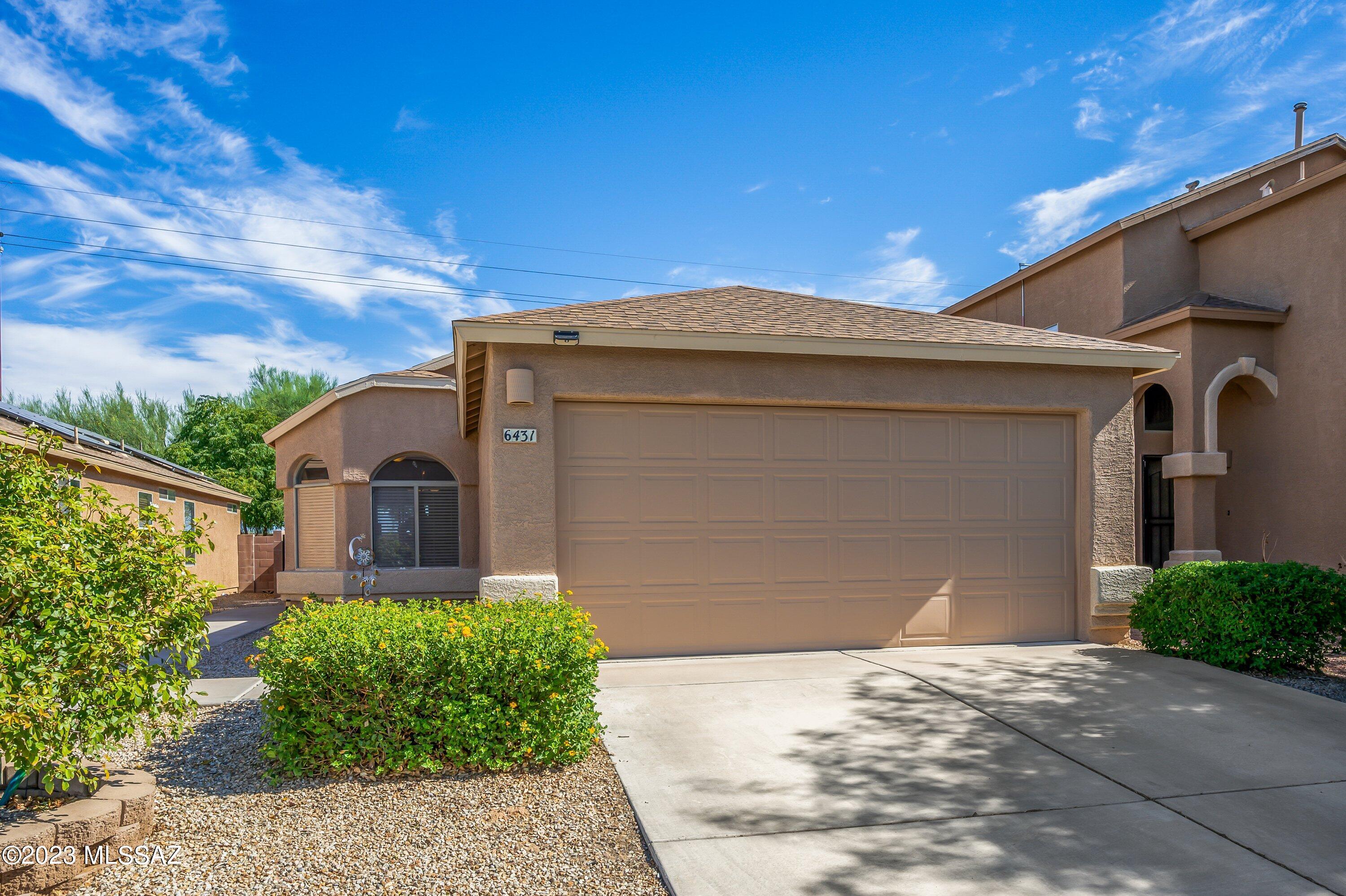 Meticulous three bedroom two bathroom home in desirable Vail school district! This home boasts a split floorplan, wonderful natural light, ceramic tile throughout - no carpet, large kitchen w/ plenty of counter space, open concept living and dining, two car garage, and perfectly sized backyard complete with pergola. Interior and exterior painted in 2022. Location is key here with easy access to i10 to get you to DMAFB, UA, Raytheon East - wherever you need to go!