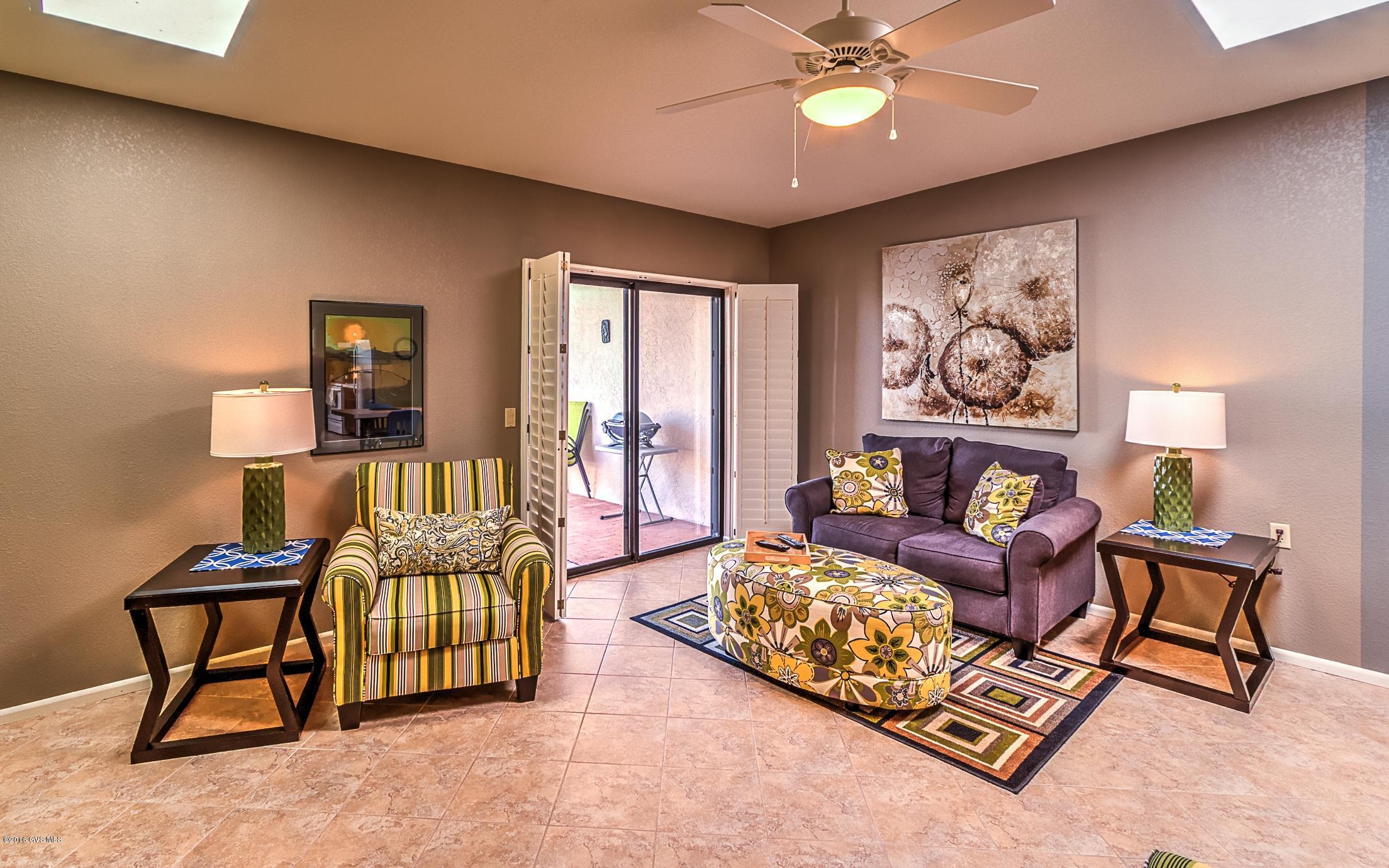 Lovely 2 Bedroom 2 bath townhome on a cul-de-sac street. Private low care back patio. Just around the corner from one of 13 Green Valley Recreation Centers.