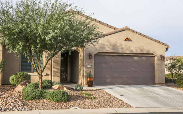 WOW! WOW! Is what you will be saying when you see this almost new Quail Creek Villa that shows like a model. Seller's have over $60,000 of builder upgrades in this home. There is no reason to build your own as this offer's top of the line everything, tile, granite, pull out shelving in kitchen & master bath. Under-counter lighting, extra cabinets in hallway, upgraded SS appliance's, & gas stove. The corner lot offer's privacy from the neighbor's patio. Also, offer's common area behind and around you. Start living the resort lifestyle @ QC without the hassle of maintaining the entire outside. Villa living offers, pest control, landscape maintenance & outdoor water, exterior painting, and roof maintenance.