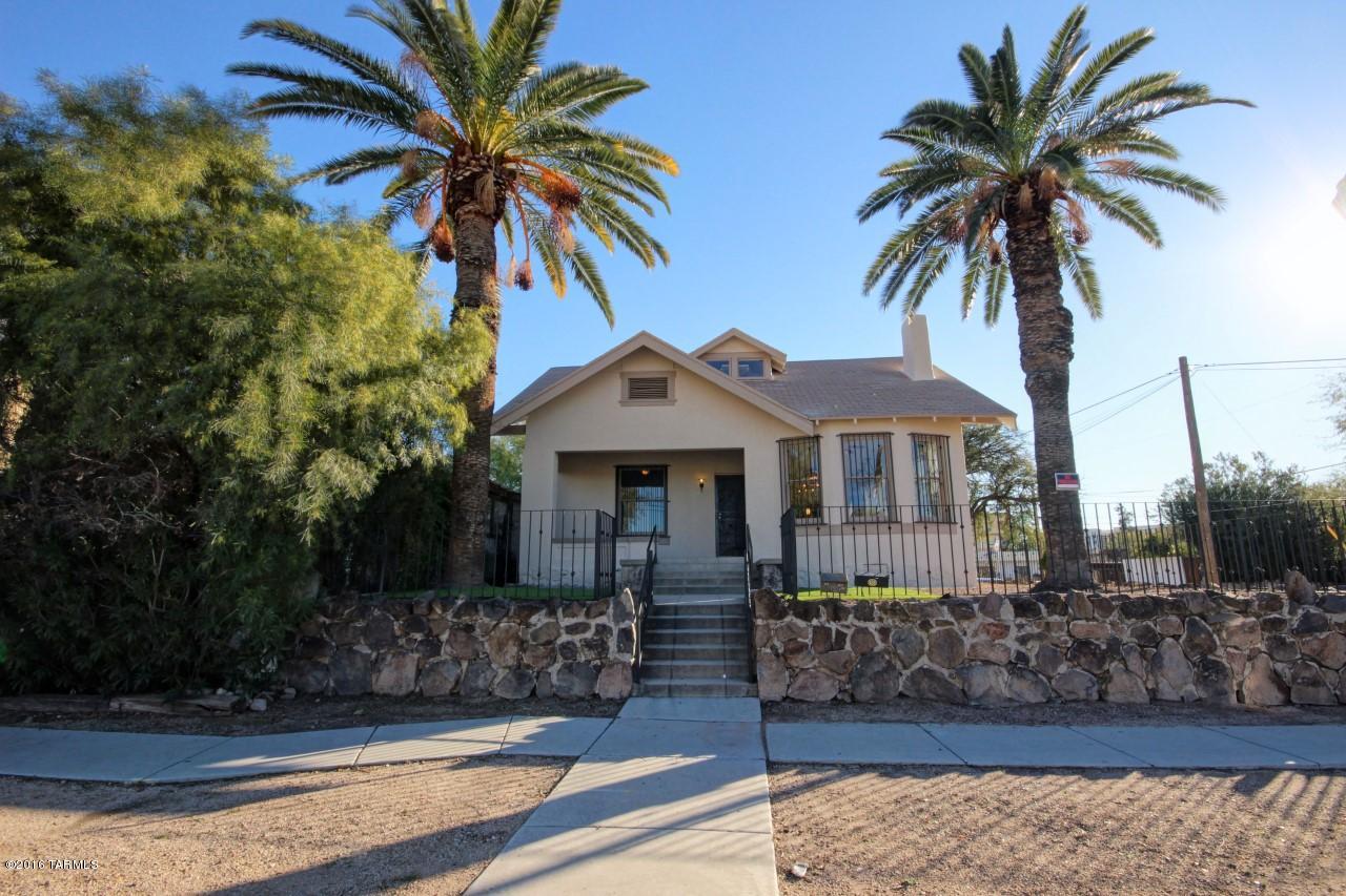 Gorgeously remodeled 6 bedroom/3bathroom 1915 home located in the heart of Tucson! All new HVAC, Electrical, Kitchen, bathrooms, flooring, blinds, appliance, etc in 2016!  Already leased through 7/2017! Unique opportunity of old school house with modern finishes on the interior. Ideal location directly south of Tucson high school, close to downtown and UofA! Fantastic rental home or owner occupant.  One of the selling members is licensed to sell real estate in Arizona!
