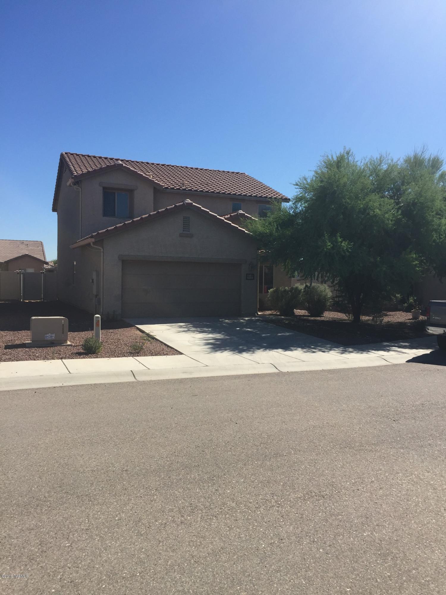 Come see this beautiful 4 Bedroom 2.5 bath home plus den or office available. Spacious 2-story home in Red Rock Village. Home features vaulted ceilings, wood blinds throughout, stainless steel appliances stove, refrigerator, dishwasher, above range microwave. Washer & dryer also included. Low care landscaping and two car garage. Community features pools, skate park, large community park, sports courts and fields. New shopping center 15 minutes away from community, conveniently located with easy access to freeway and minutes away from Picacho Peak State Park for camping, hiking or picnic and much, much more. This home comes with 24 hour maintenance emergency service, so it is maintenance free. Please call, text or email Michael at (520)837-9794 today to inquire about viewing this home today