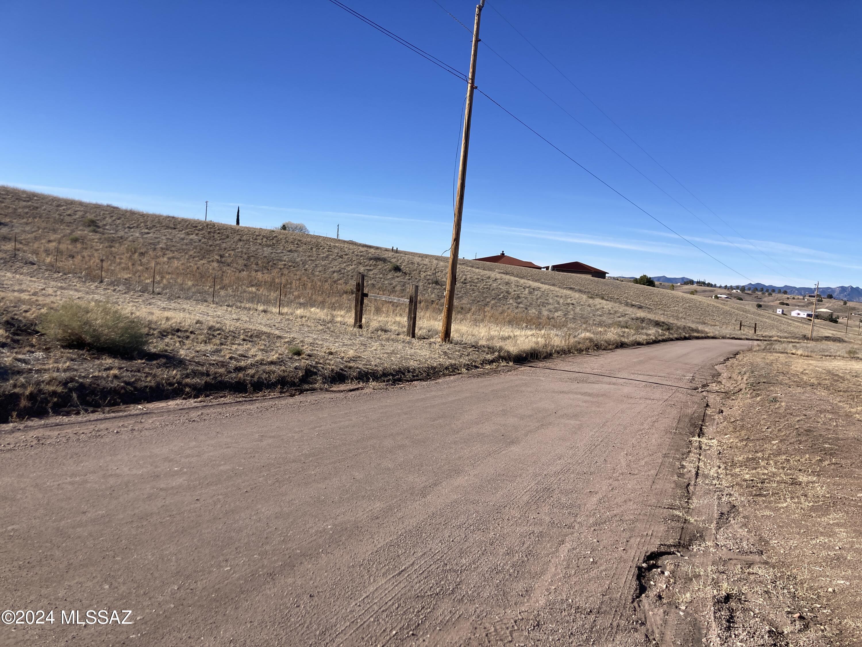 Rolling 3 3/4 acres in attractive residential subdivision - good roads to property - makes a great homestead