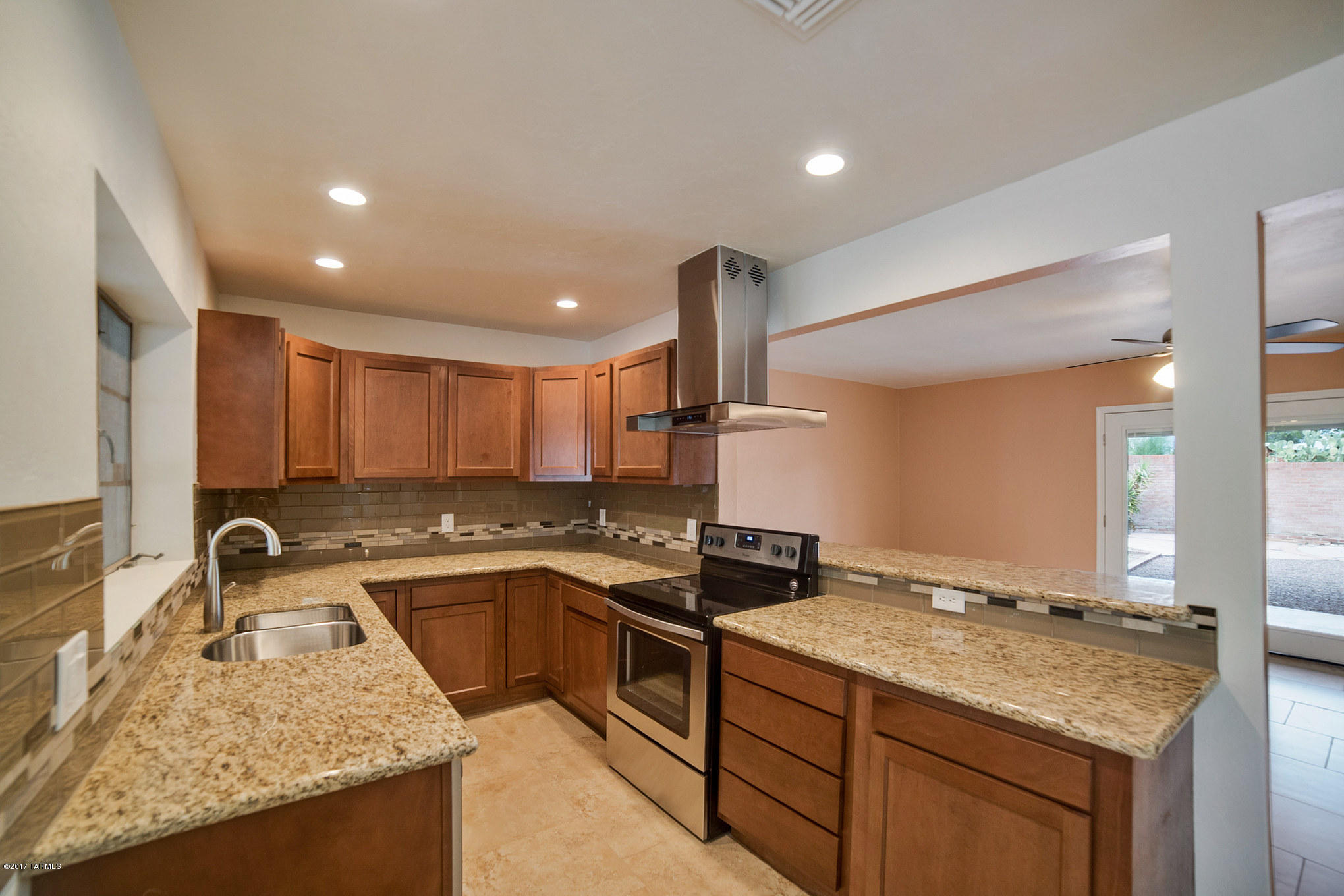 Seller will entertain offers between $255000 and $275000. Extraordinary recently Renovated 4 bed, 3 bath brick home. Rare Large Square Footage home for the neighborhood, a must see!  Newly added spacious master bed/bath with walk in closet, Jacuzzi tub, and double sink vanity. Brand NEW Dual-pane Windows!! All 3 bathrooms have NEW vanity cabinets, new granite counter tops, new mirrors & new tile surrounds with deco accents. The entire home has NEW 20'' porcelain tile floors throughout. Updated stainless appliances and kitchen with new cabinets, granite countertops and bar top open to the living room.  Brand NEW central air conditioning/heating system and water heater located in the spacious laundry room. Attic storage with plywood base. Everything permitted. So Relax and Enjoy! Owner/Agent