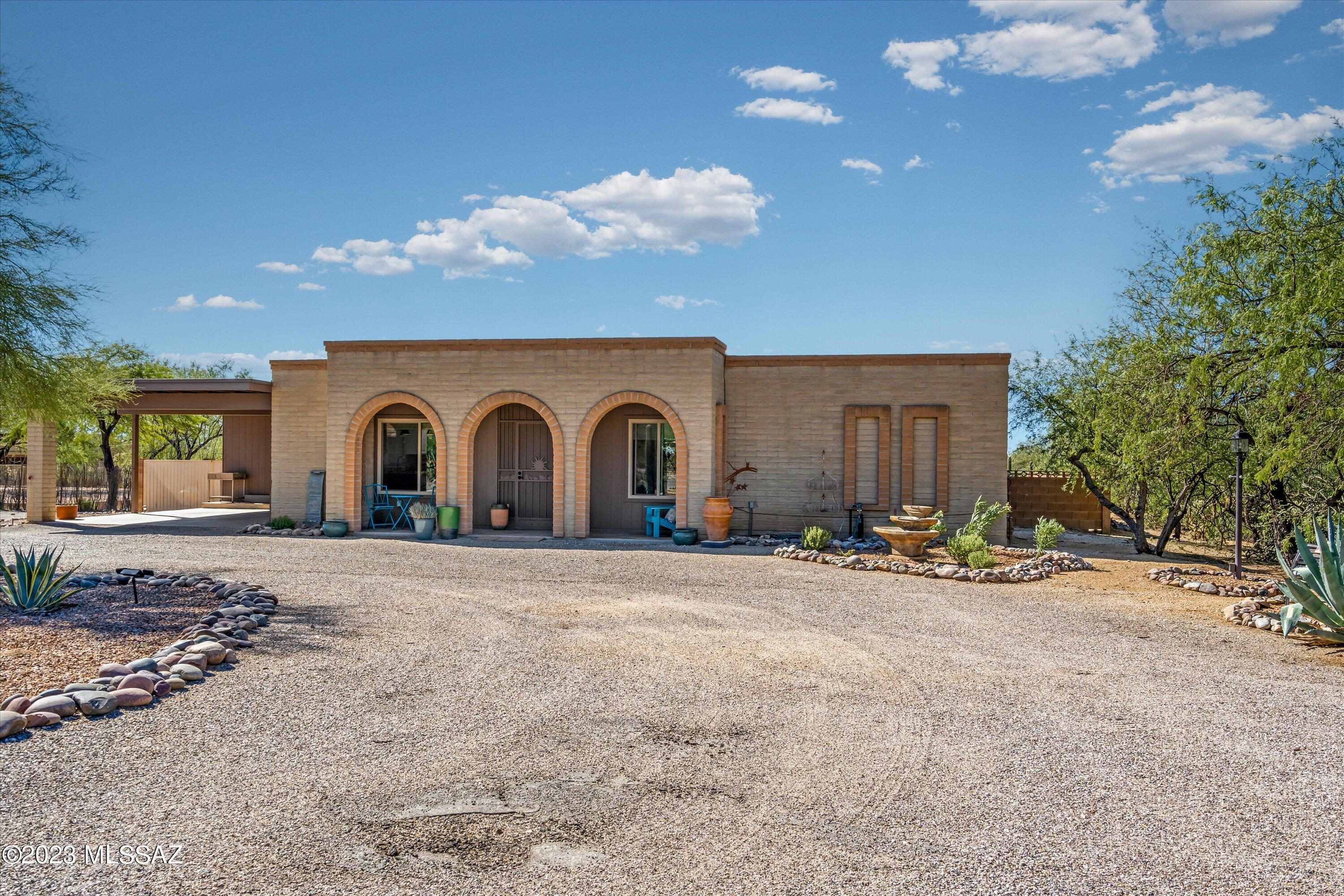 Mountain views, .83 of an acre, peaceful location on small cul-de-sac.
Scored, stained concrete floors in living spaces, wood laminate in bedrooms, ceiling fans and new windows.  Granite countertops and stainless steel appliances.
Backyard features swimming pool with diving board, covered patio, ramada and fantastic outdoor kitchen with built-in-BBQ, refrigerator, wine fridge and fireplace. Double gate to back yard for easy storage of RV, boat, trailer, etc. Enjoy open space with no HOA, yet close to schools, shopping and restaurants. Removable pool fence will remain with the property.