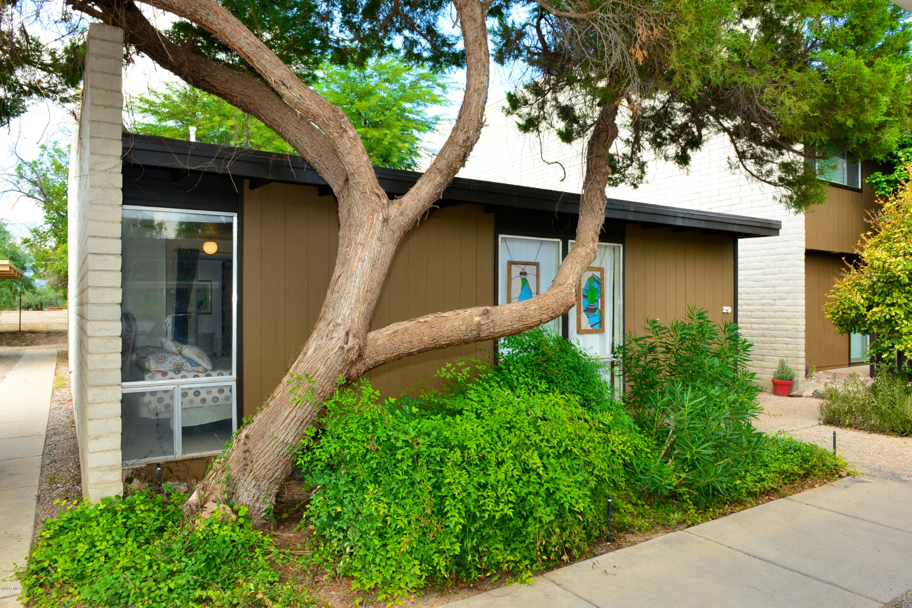 Range Price. Seller will accept or counter offers between $129,900 to $139,900.This END UNIT,2bed/2bth townhouse (w/two carport spaces) is calling your name! A darling little gem that is nestled just behind Ft. Lowell Park & Historical Museum, a perfect spot for a family, snowbird or even a TMC employee! Let the sun saturate you in the bright, open & airy rooms while still feeling secluded in the private & serene lush yard. Lovely little surprise decorator extras to enjoy like the Talavera bathroom sink, cheery sunflower accent paint & built-in bookshelves for your special collections.Enjoy the sparkling community swimming pool on a hot day, or cool AZ evening sunsets with a glass of wine while taking in the views of the Catalinas! Come, visit, and FALL-IN-LOVE! Agent related to seller.