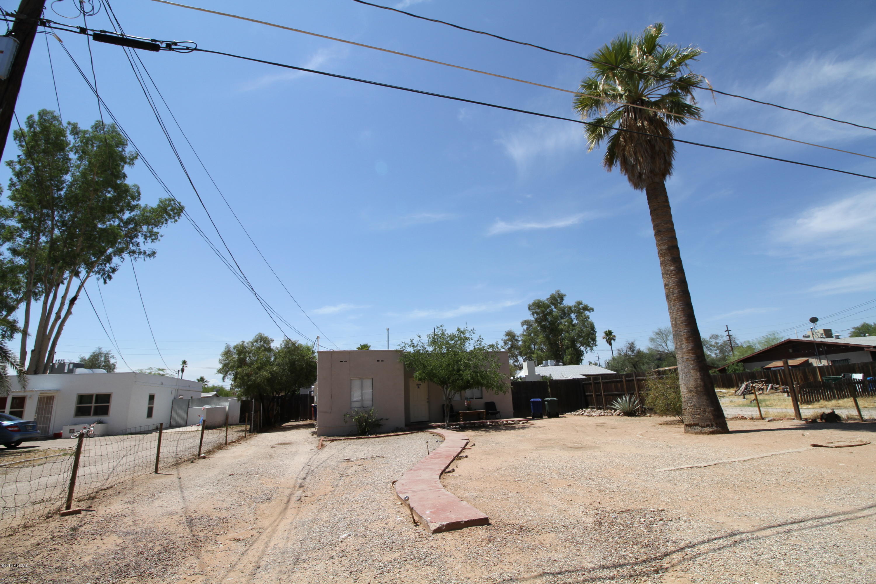 Nicely remodeled duplex with great income in the heart of Tucson close to the University of Arizona, Downtown, shopping, overall a great location. Both units are free standing/detached and enjoy good size yards. Front unit is 2 bedroom 1 bath, back unit is 1 bedroom 1 bath. All utilities are tenant paid- currently tenant occupied, DRIVE-BY ONLY please do not disturb tenants. Listing broker has ownership in the LLC that holds title to this property.