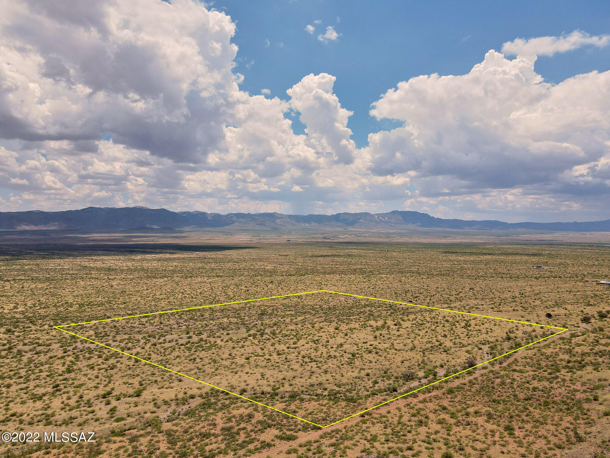 This 38 acre parcel is located north of Horseshoe Canyon in the foothills of the Chiricahua Mountains.  Solar powered well in place and permits/plans pulled for installation of septic system.  Land cleared for build locations and ready for you to build the high desert home of your dreams.  Portal, AZ is home to a diverse plant & animal population, dark night skies, and arguably the most beautiful sunrises and sunsets in the southwest.  Solar Pump System: Pump depth:  415 feet, Measured water flow rate:  215 gallons per hour (May, 2022). Water storage tank:  275 gallons.  Well Casing:  4'' PVC @ 460 foot depth.