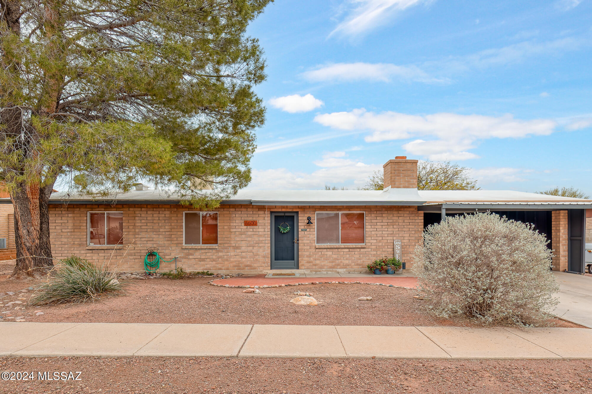 Come see this lovely 3 bedroom, 2 bath home in Lincoln Ridge Estates. You'll enjoy spending time in the living room, with polished concrete flooring & a corner Kiva fireplace for cold winter evenings.  The open kitchen has been updated with dual toned cabinets & new granite-like laminate countertops. Stainless appliances! The home has updated recessed lighting. Newer light fixtures throughout the home with new faucets in both bathrooms & kitchen. The primary & hall bath have new laminate countertops. There is a large laundry room that has space for a pantry area and extra storage.  A large separate storage shed in the back yard - only a few years old. Lots of possibilities!  Backyard patio has extended pavers- great for entertaining. Conveniently located by shopping and restaurants