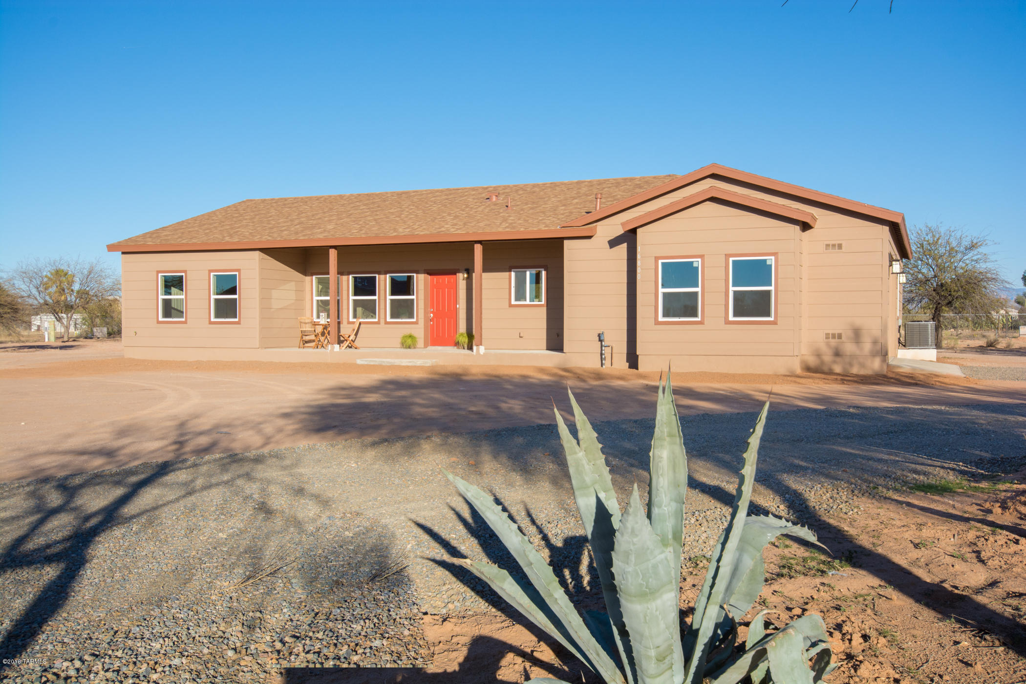 Beautiful brand new 4BR home on over an acre of land right off paved roads. This home includes wood and ceramic tile floors, custom cabinets, granite counter tops, stainless steel appliances, designer faucets and lighting, 2x6 construction, energy efficient insulation, large covered porches and a two car garage. This property is zoned to have  a second home or guest home if wanted. You also can have horses, car garages, etc. The options are endless. Country living at it's best! Listing agent is related to the sellers.