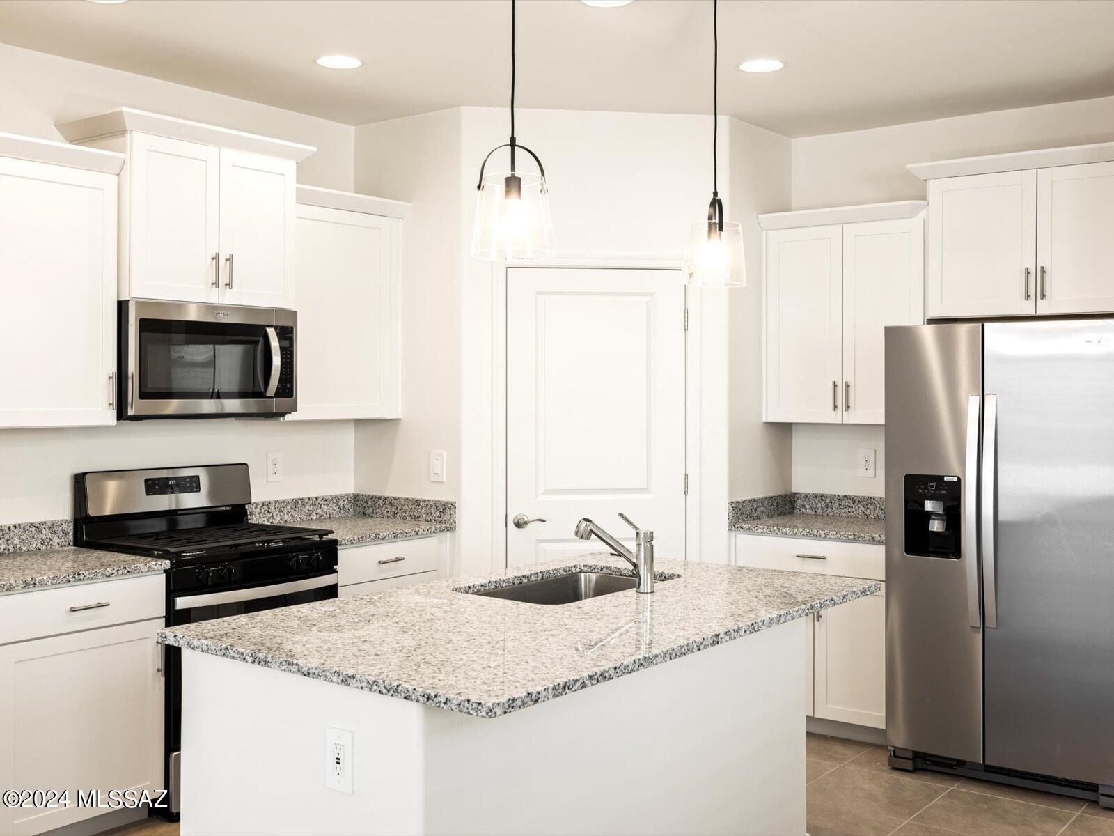 Brand NEW energy-efficient home ready NOW! There is plenty of storage space with the pantry in the kitchen and closets for linens and coats. White cabinets with cream/black granite countertops, Travertine-look tile flooring and warm grey carpet in our Cool package. Visit the Hanson Ridge community in Vail, Arizona. Set against the stunning backdrop of the Rincon Mountains, this community is located within the highly desirable Vail School District and offers easy access to the 1-10 and major employment centers. We build each home with innovative, energy-efficient features that cut down on utility bills so you can afford to do more living.* Each of our homes is built with innovative, energy-efficient features designed to help you enjoy more savings, better health & real comfort.