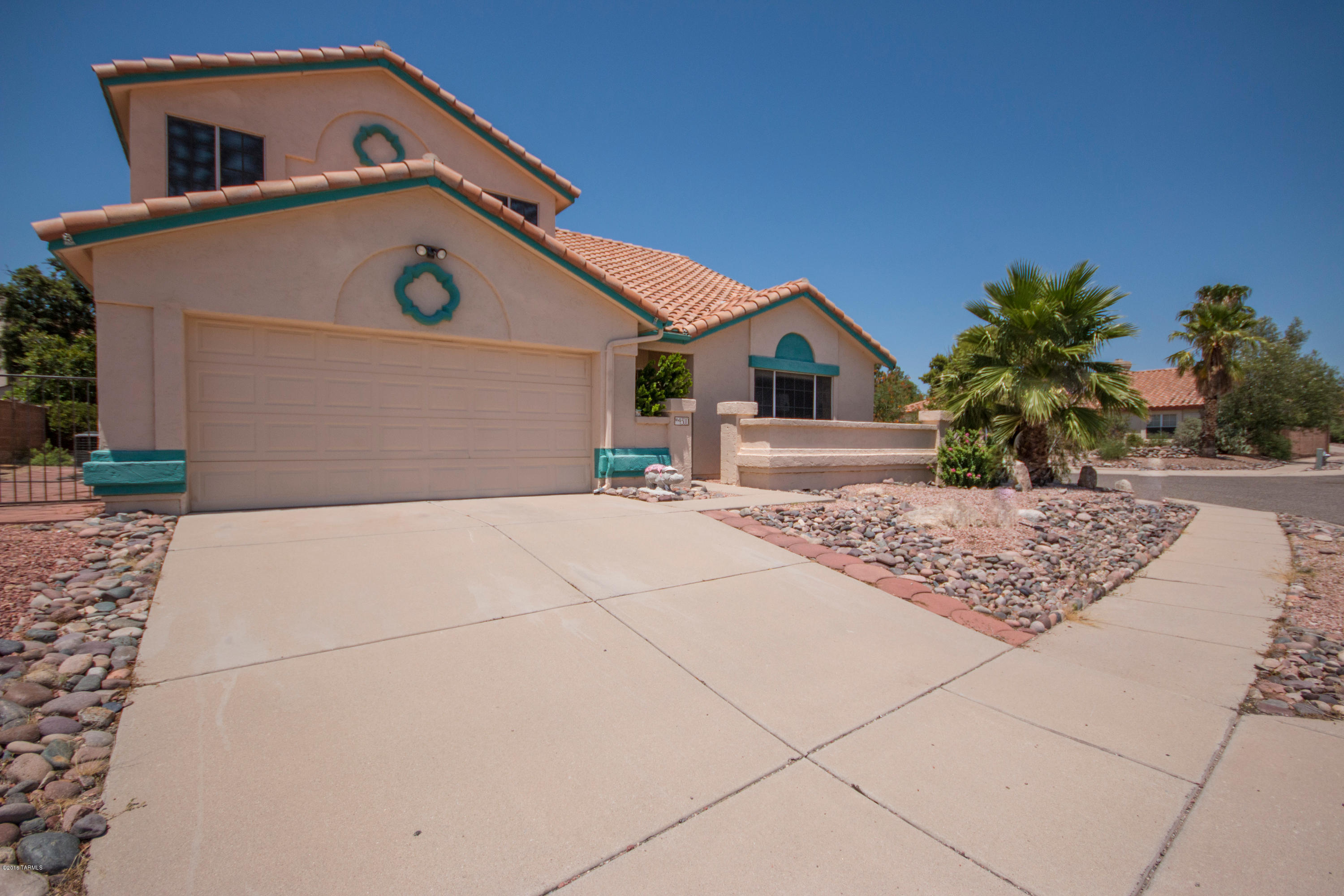 Beautiful 2 story home in great condition! Well maintained Northwest neighborhood with no HOA! This home features an open kitchen & dining area, a family room with a cozy fireplace, formal living room & dining room, a half bath downstairs, & all bedrooms upstairs! Relax in your sparkling pool, under the covered patio, or on the side of the home in the lovely garden while enjoying beautiful mountain views!