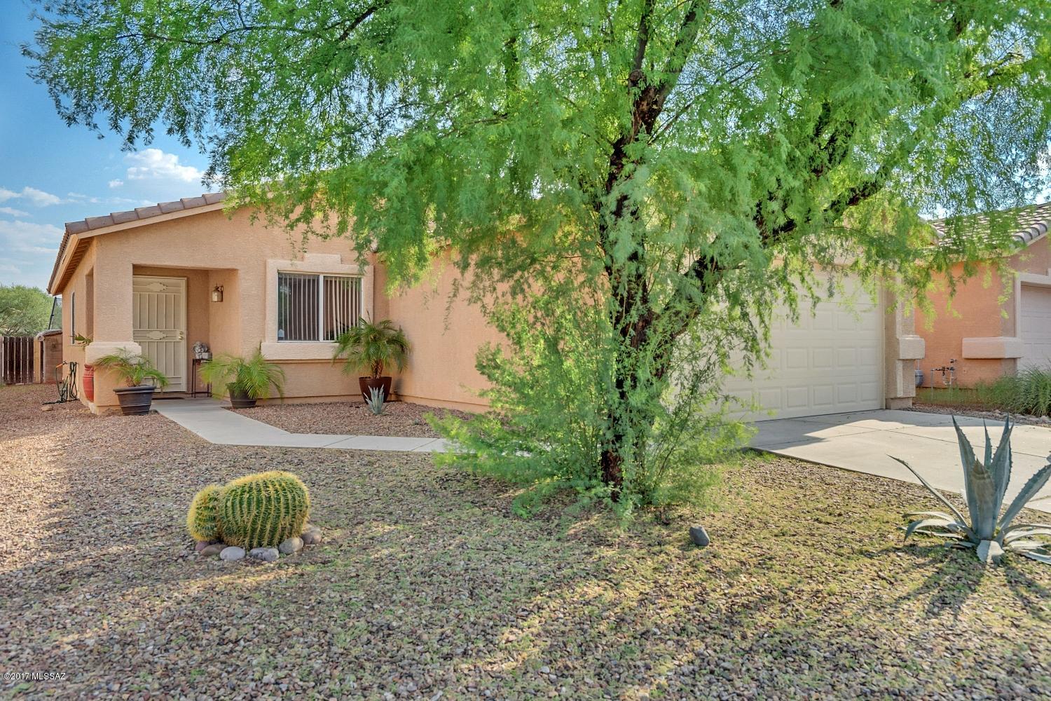 Immaculate 3 BR, 2 BA home with ceramic tile throughout. Super clean and move-in ready. Great room floor plan. All appliances are included. This home has a convenient location close to shopping, the UofA, Pima College, and St Mary's. Don't miss it.