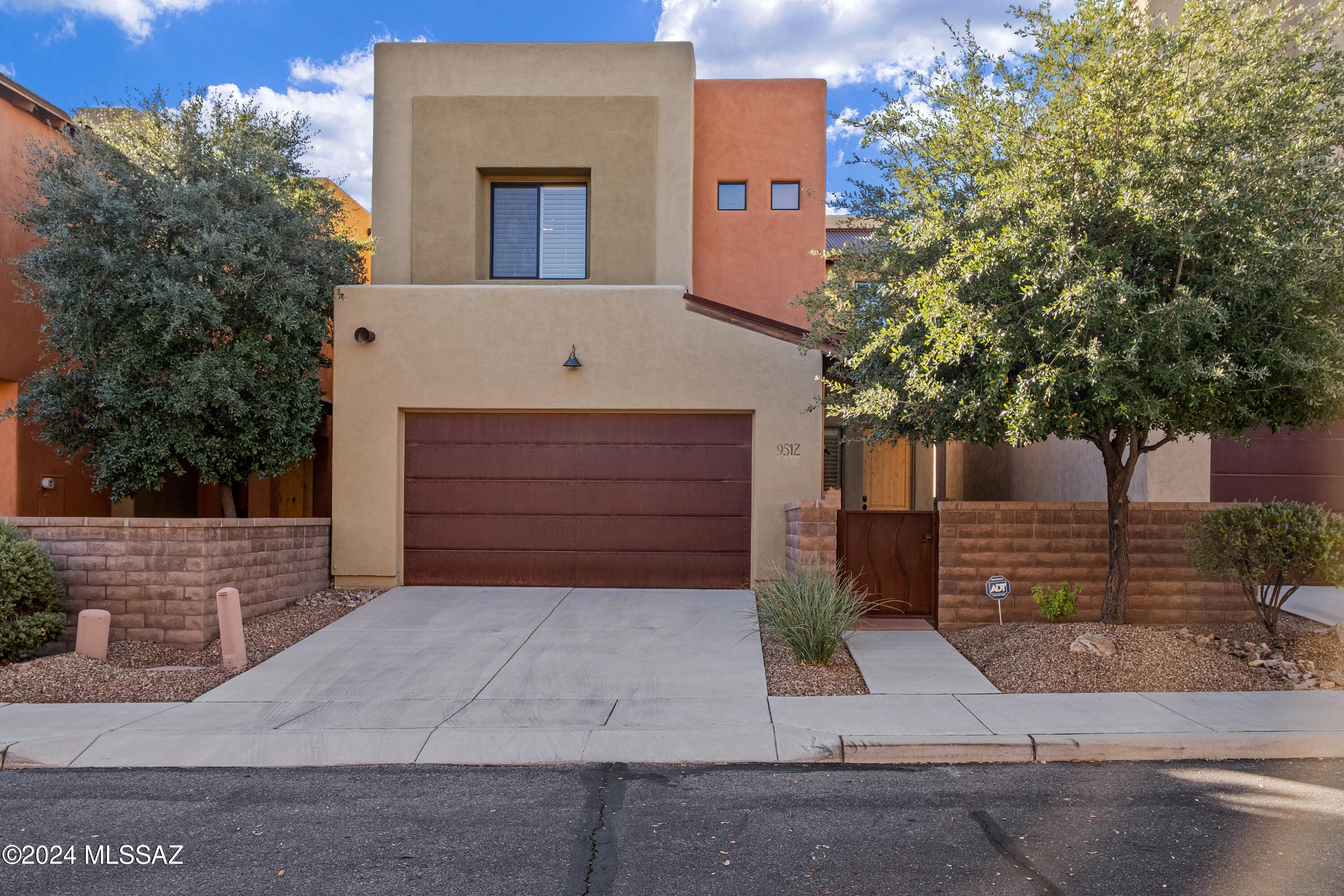Your slice of paradise in Tucson's enchanting Northeast awaits to welcome you! This beautifully maintained two-story home is where comfort meets charm, offering 1,964 square feet of thoughtfully designed living space with 3 bedrooms and 2.5 baths. Imagine gathering in the sunlit living room, where every corner is perfect for creating memories, or sharing meals in a kitchen that inspires culinary magic, seamlessly connected to the dining area. Step into a backyard retreat with a built-in BBQ and calming water feature, an ideal setting for starlit evenings and al fresco dining. With nearby shopping, dining, and scenic surroundings, this home offers both convenience and a sense of retreat. Perfect as a first home or a serene getaway, it's a rare gem waiting for you to create lasting moments.