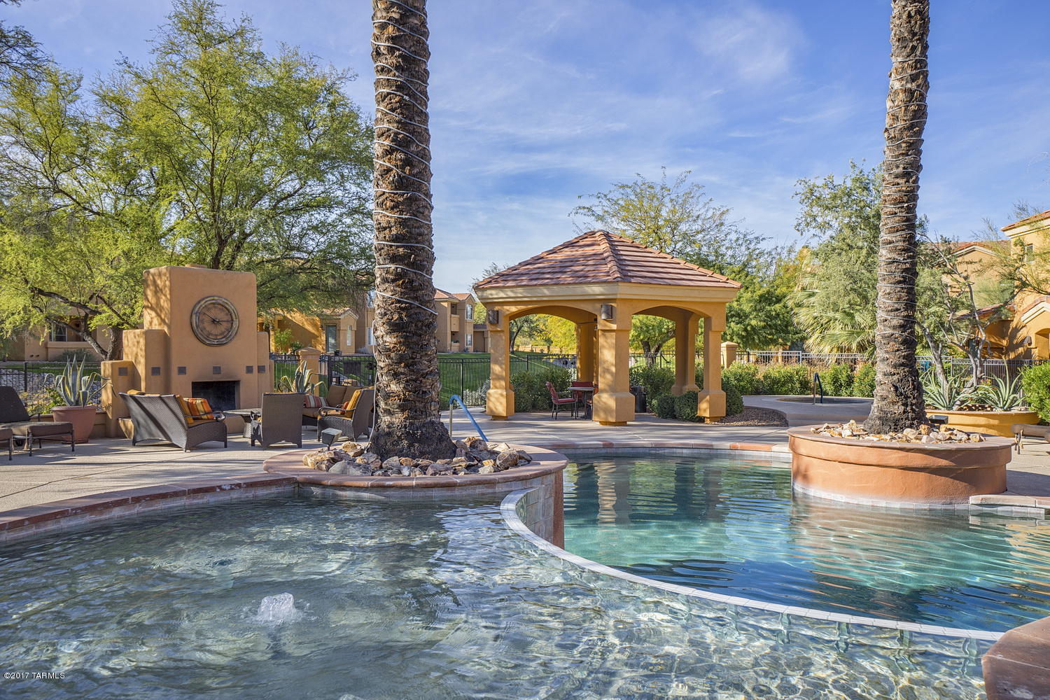 Convenient Catalina Foothills location!  Beautiful 2BD/2BA fully furnished condo located in Pinnacle Canyon near Sabino Canyon, shops, dining and much more.  This upstairs, end unit offers mountain views, split bedrooms and a spacious living/dining room.  Resort-like amenities include a heated pool, spa, fitness center and clubhouse.  Gated community.  Please call for seasonal rates!  520-395-7202