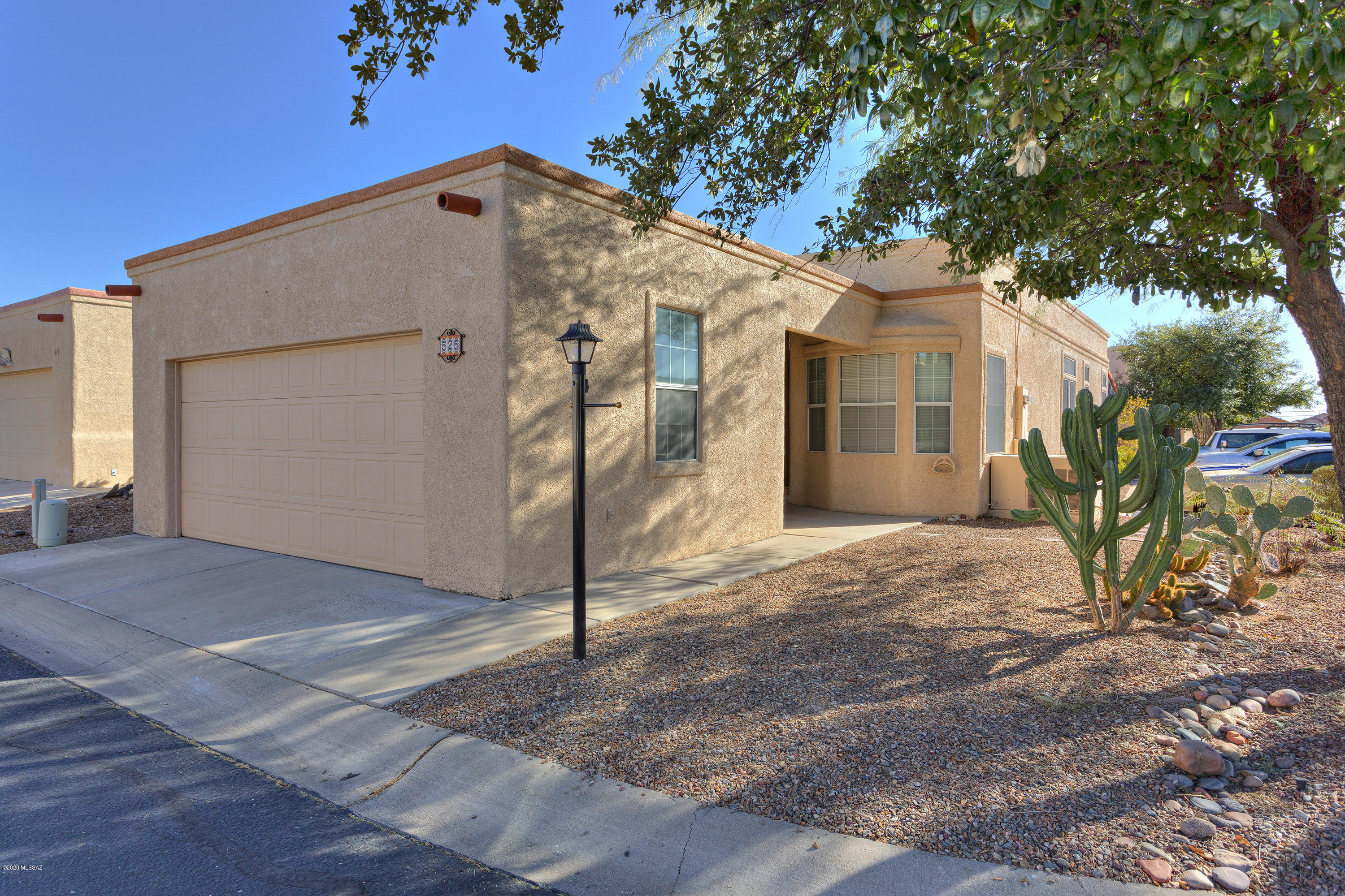 Welcome to this beautiful home that glows with lots of natural light and has charming wood floors.  Home has hardly been lived in and is well maintained.  Seller added knobs to the cabinet doors, tiled the screened in porch and put artificial grass in the yard.  If you are looking for a home with no GVR and community activities, look no further.  This is an active adult community with its own pool, fitness, center and lots of activities for the residents here in Canyon View Estates.