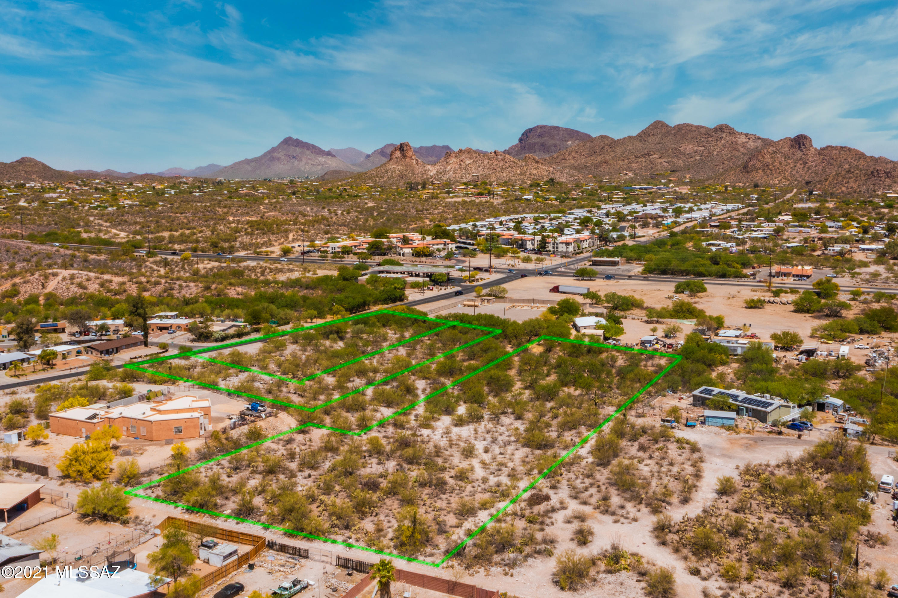 Stunning 1 acre lot with terrific mountain, city & desert views. Own the entire lot to build your dream home or adjoining 4.09 & 1 acre parcels and possibly build 5 more custom homes. Utilities at lot line.  No HOA & close to shopping, downtown & much more. Seller may consider seller financing, ask agent for details.