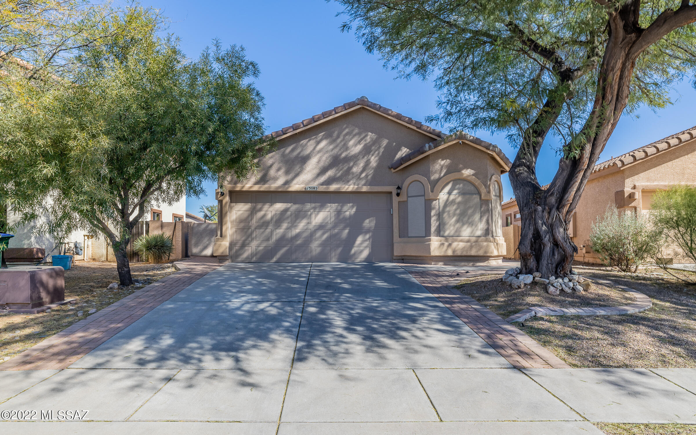 Home sweet Home! Located in the highly desirable Rancho Sahuarita Community, this beautiful home is ready for your family to move in. It's situated on a cul da sac just a few steps away from the Sahuarita lake
where you would enjoy kayaking, canoeing, fishing, or just strolling around the lake. The home features 3 bedrooms and a den off of the living room. Stepping into the home you are welcomed by a spacious floor plan, perfect for everyday living & entertaining. The owner's suite comes complete with a walk-in closet and an en suite bathroom. Step outside into the large low-maintenance backyard. The Rancho Sahuarita community amenities include a minute walk to the lake,parks, rec center,gym,pool,spa,and splash pad just to name a few. Don't miss the opportunity to see this remarkable home