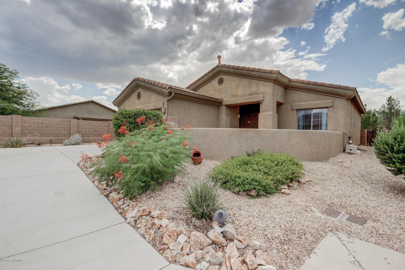 This single level home perfectly situated on a cul-de-sac lot located in 55+ La Joya Verde ll is just the house you've been looking for! Complete with a private courtyard, perfect for watching the sunrise! Eat in  kitchen has breakfast bar, plenty of cabinet space and white appliances. Large master suite has plush carpet with ceiling fan and a spacious walk in closet! 3/4 bathroom with double sink vanity. Oversized backyard features an extended covered patio with easy to maintain desert landscaping! Plenty of room for entertaining! A house priced this right, is sure to go quick. You don't want to miss out, so come see it today!\