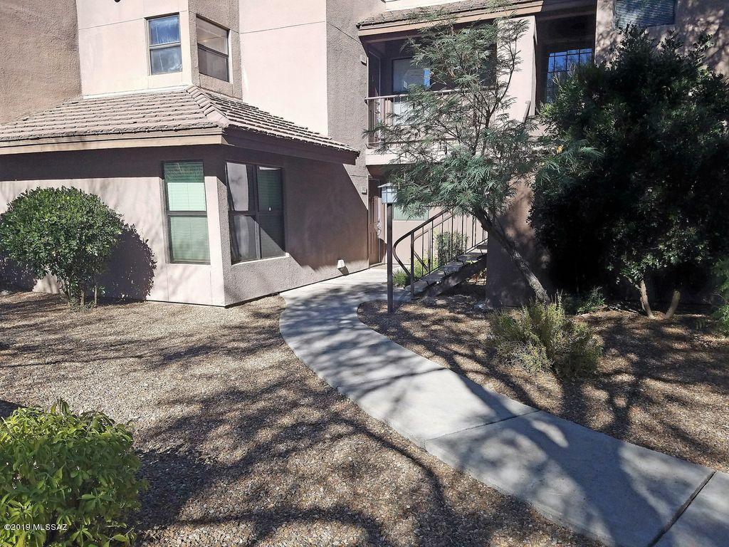 Amazing location in the Catalina Foothills! Close to Sabino Canyon, Lowes Ventana Resort, Canyon Ranch, Cycling paths, wonderful restaurants, Golf, Hiking & much more! You will have great Views from this ground floor, two bedroom, two bath Condo that features a fireplace, newer wood floors in the main living spaces, newer carpet in the bedrooms & recently painted throughout. Greens at Ventana Canyon is a premiere luxury property w/3 pools (2 are heated in the winter), 2 spas for your enjoyment, a fitness center, & great views of the mountains throughout the complex. This property is great for a year round owner or for a winter visitor/investor. There is a property management company onsite that can help you handle your property as a rental if you so choose. Association fee includes: Trash, Water, Sewer, common area maintenance, Roof & landscaping.